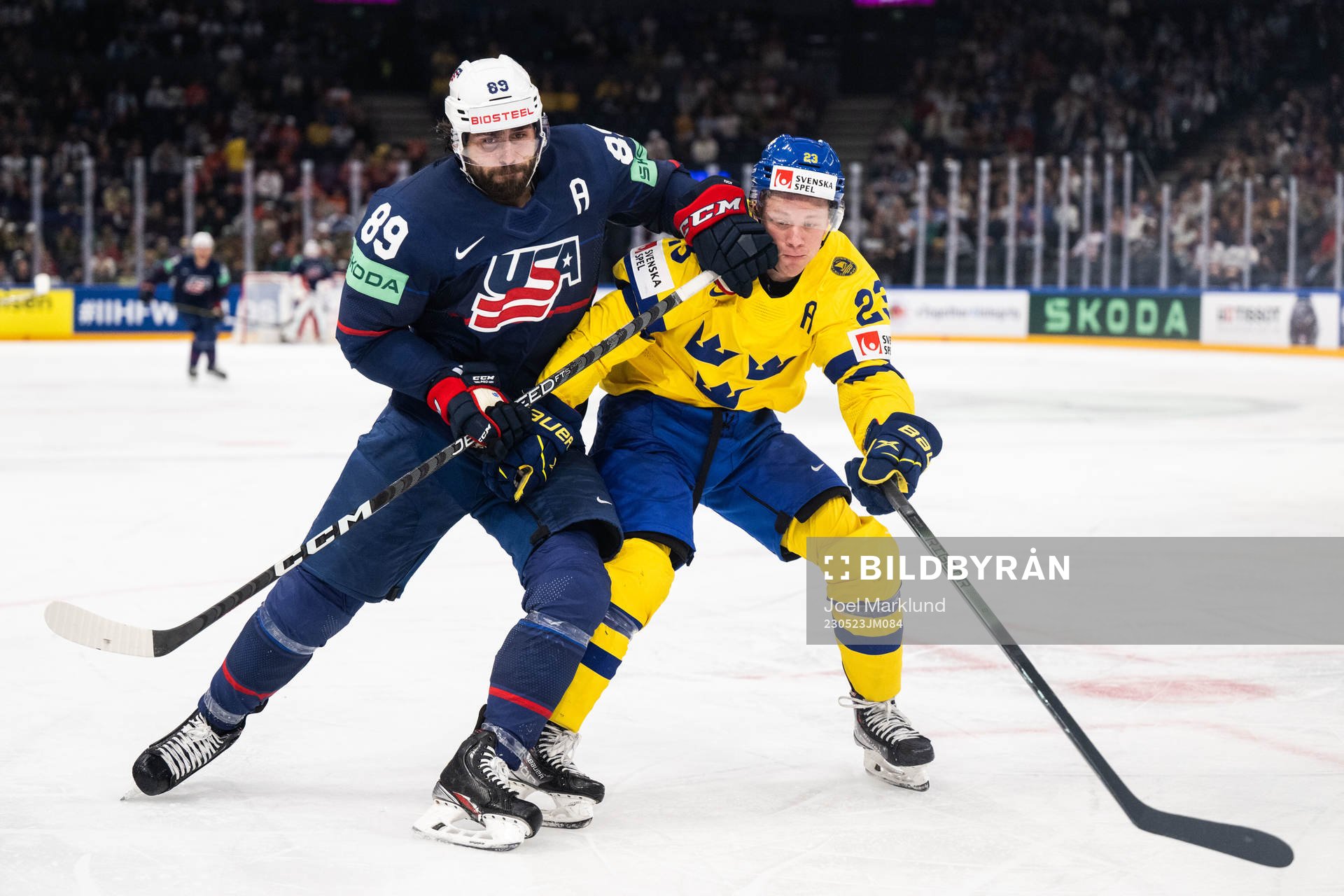 Alex Tuch of USA and Lucas Raymond of Sweden