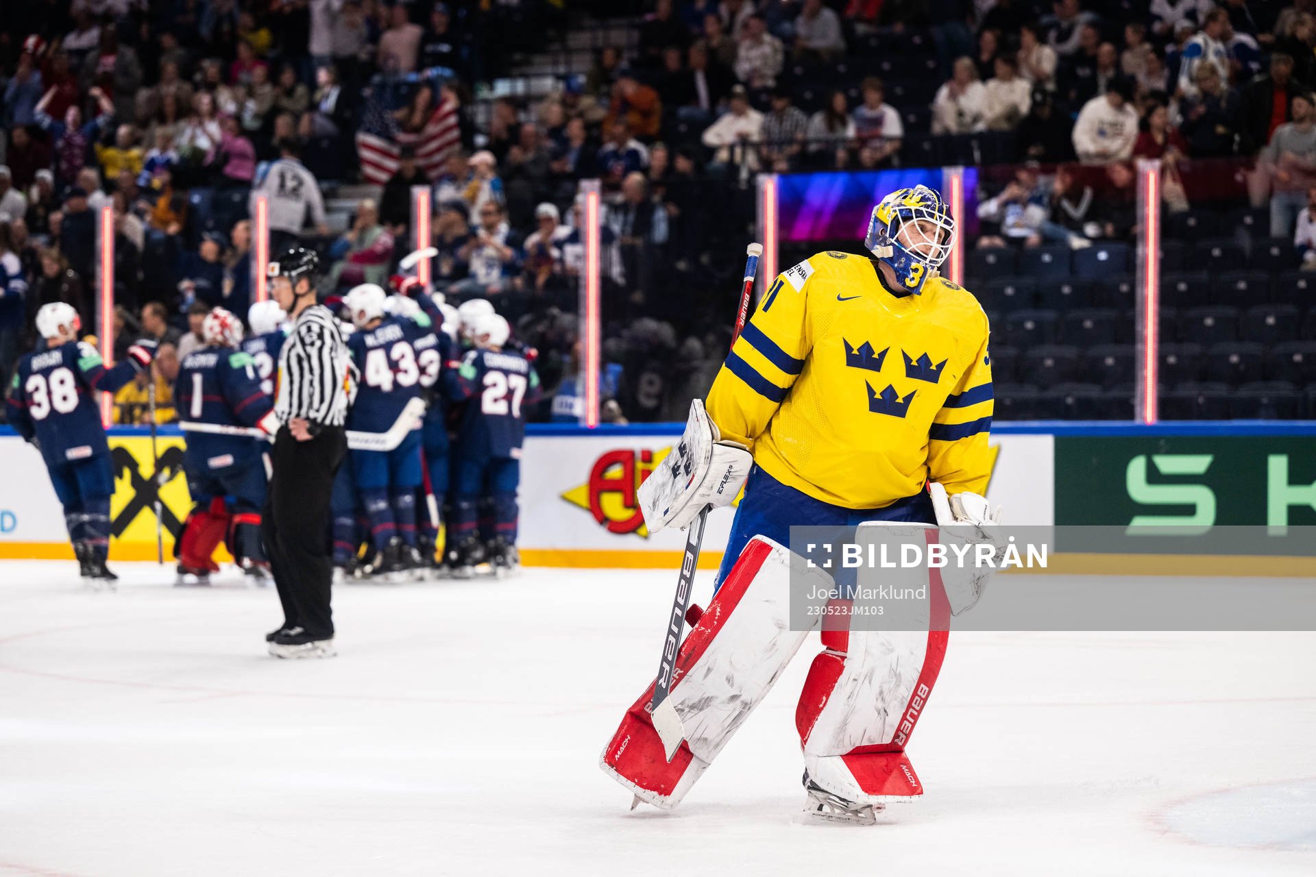 Goaltender Lars Johansson of Sweden looks dejected