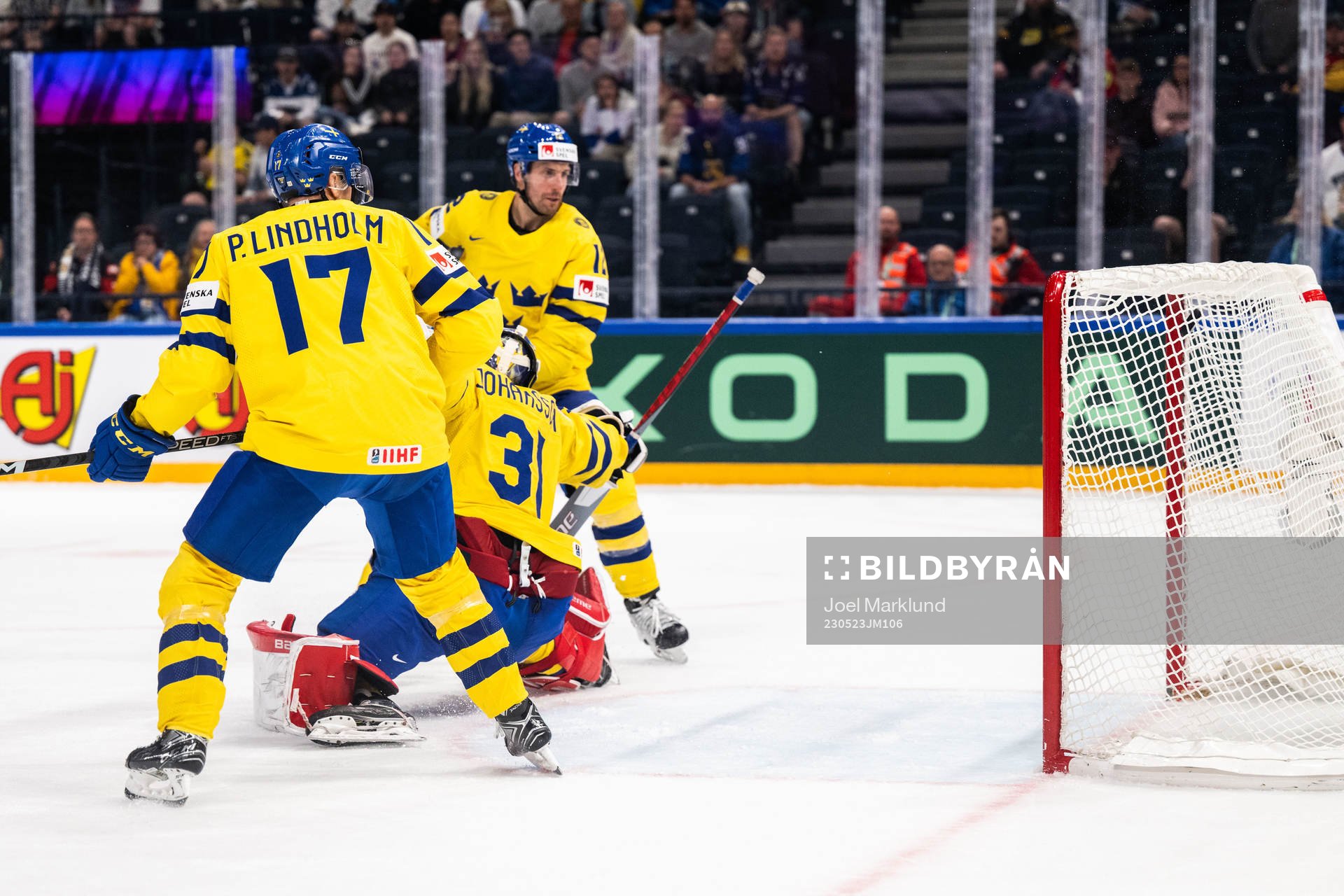 Pär Lindholm, goaltender Lars Johansson and Patrik Nemeth