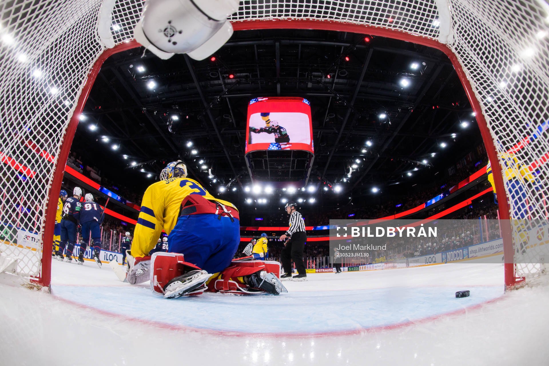 Goaltender Lars Johansson of Sweden looks dejected
