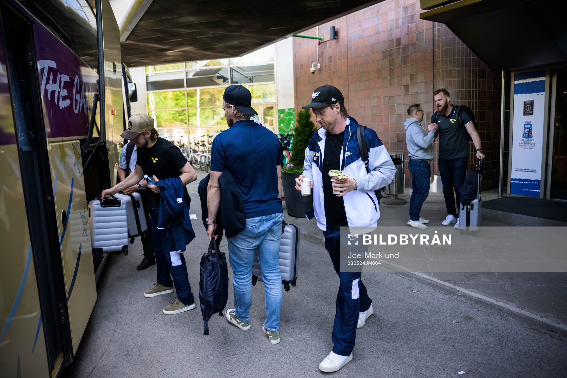 Rasmus Sandin of Sweden boards a bus when traveling from