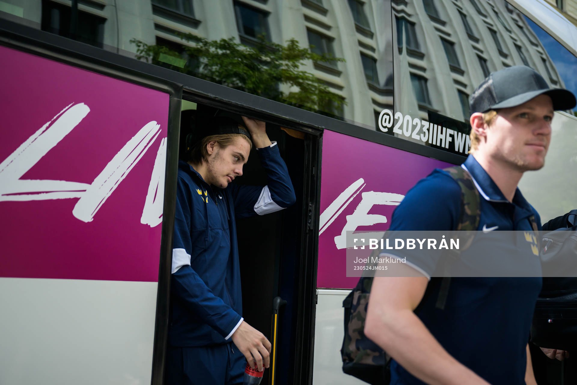 Leo Carlsson and goaltender Lars Johansson of Sweden leave