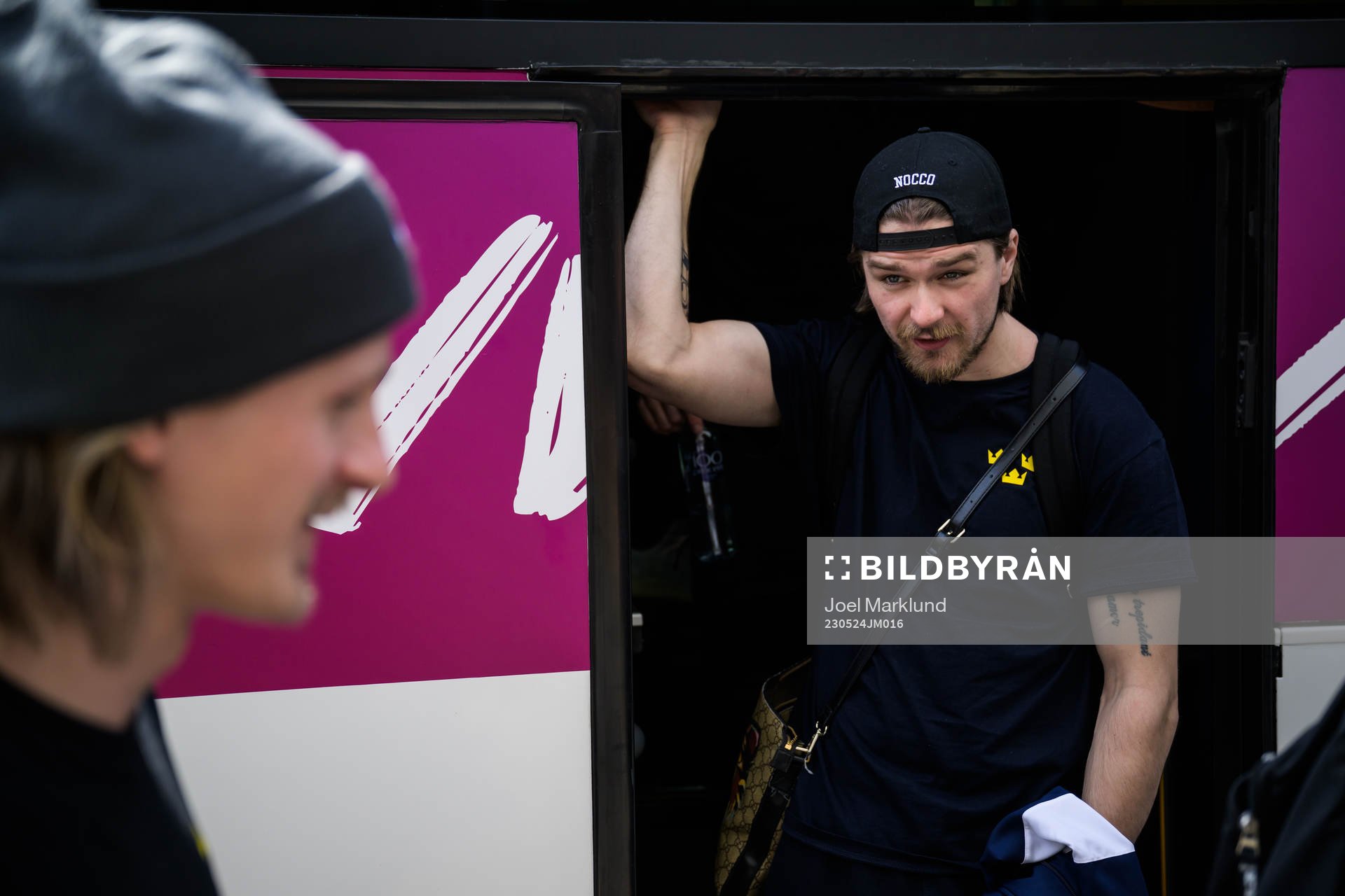 Linus Johansson of Sweden leaves a bus when traveling from