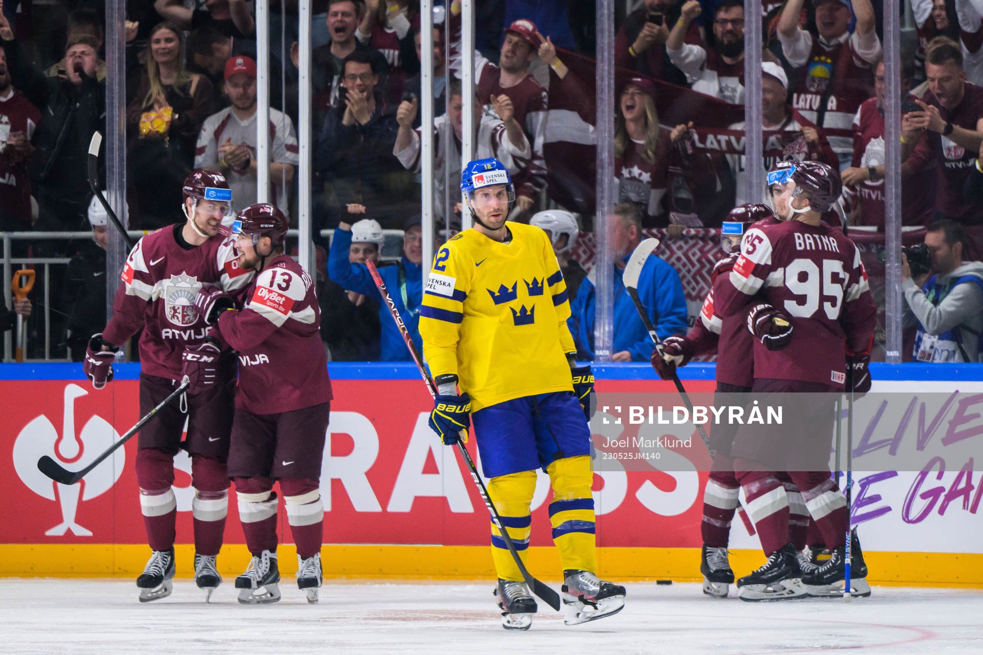 Patrik Nemeth of Sweden looks dejected while Miks Indrasis