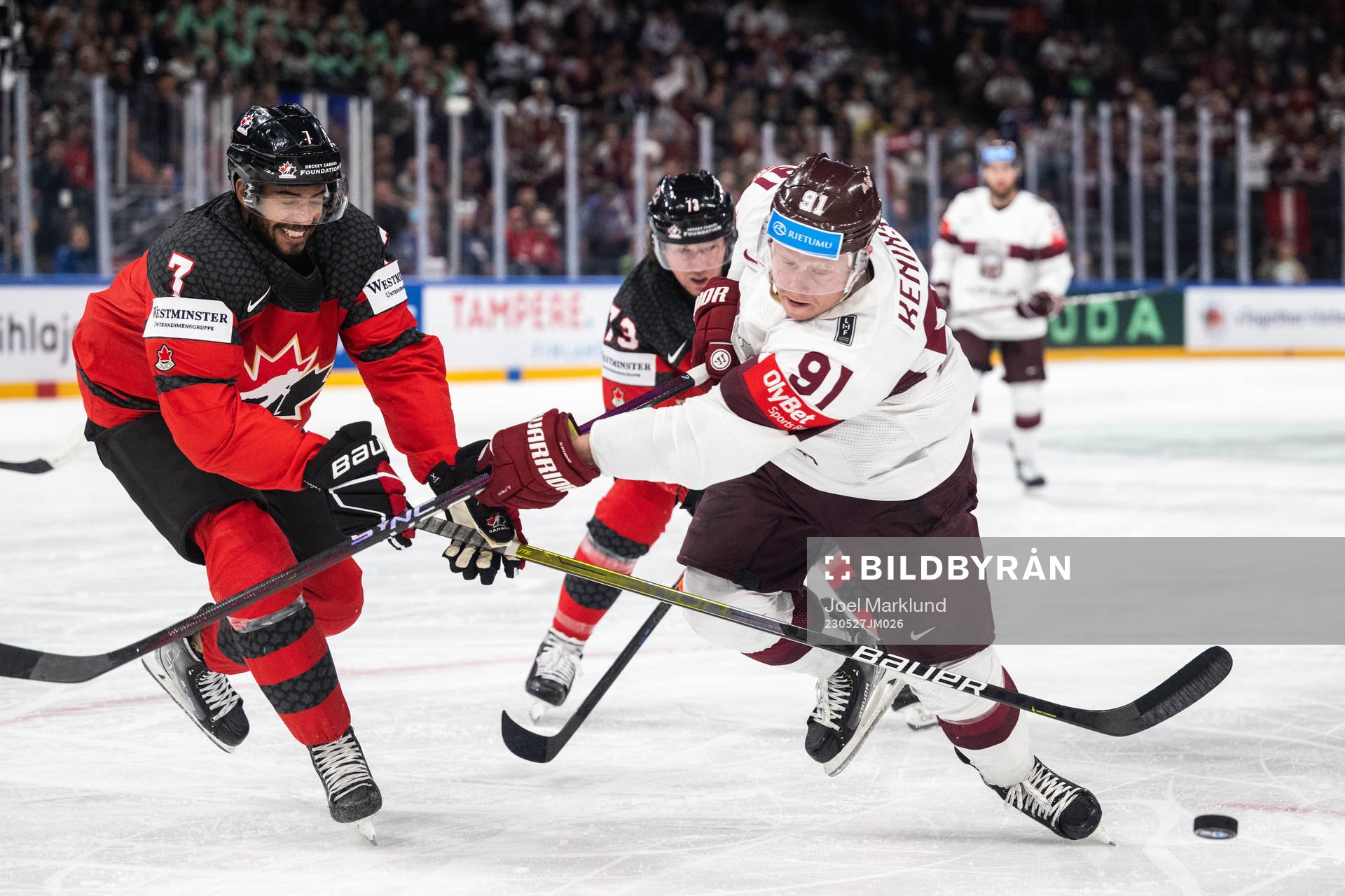 Pierre-Olivier Joseph of Canada and Ronalds Kenins of Latvia
