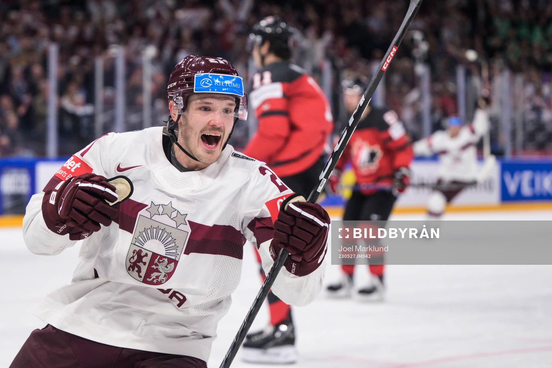 Rudolfs Balcers of Latvia celebrates scoring the 1-2 goal