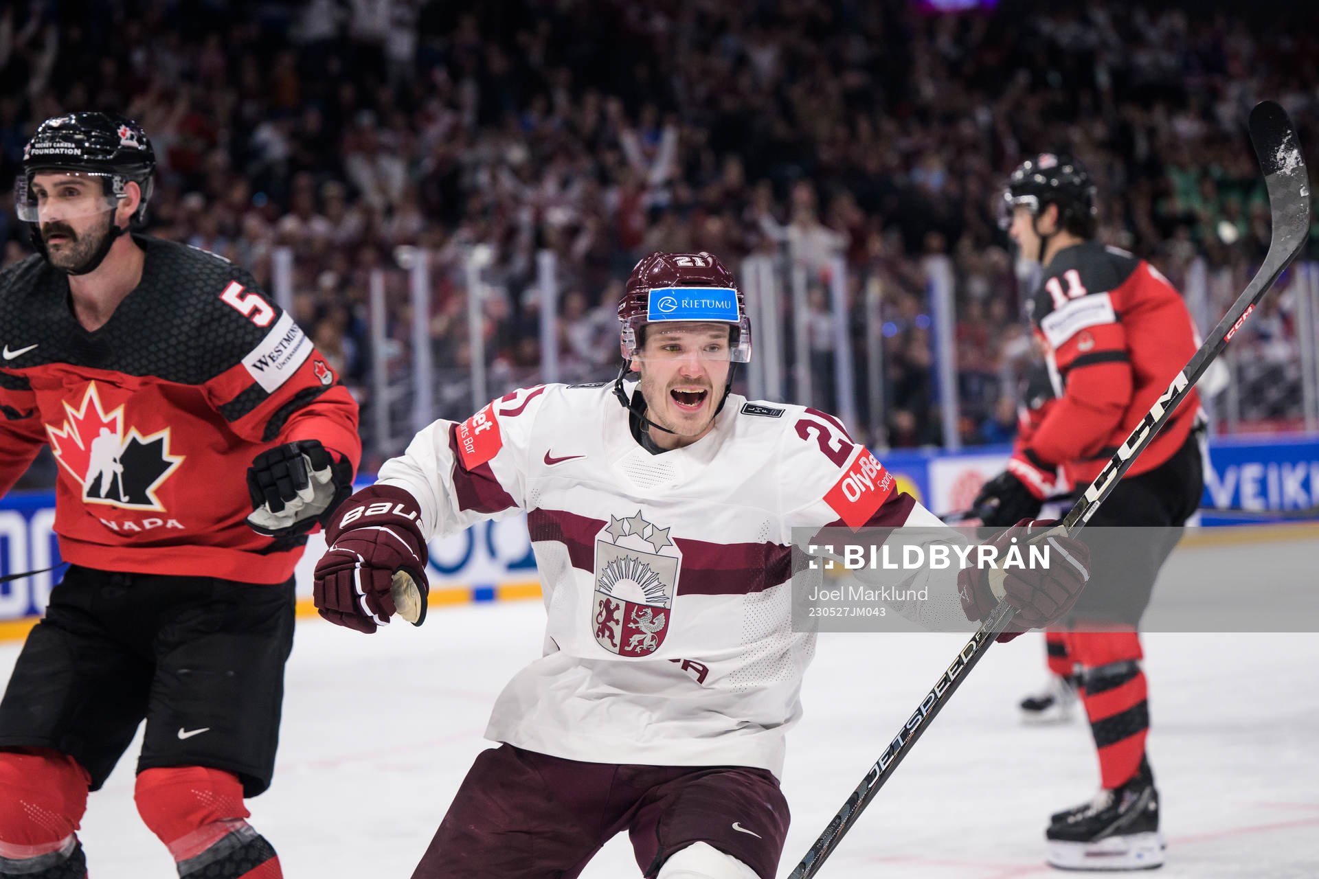 Rudolfs Balcers of Latvia celebrates scoring the 1-2 goal