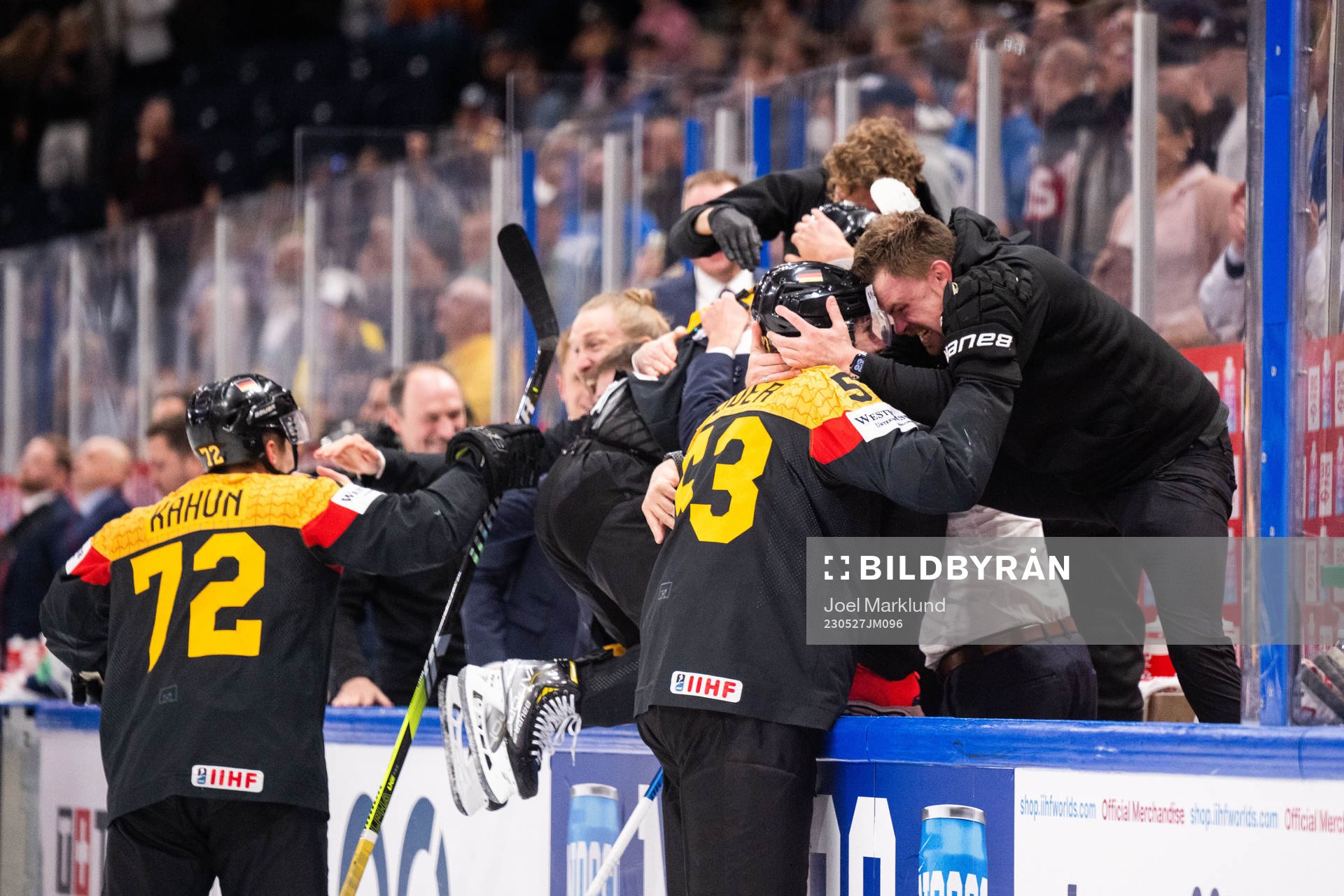 Dominik Kahun and Moritz Seider of Germany celebrate with