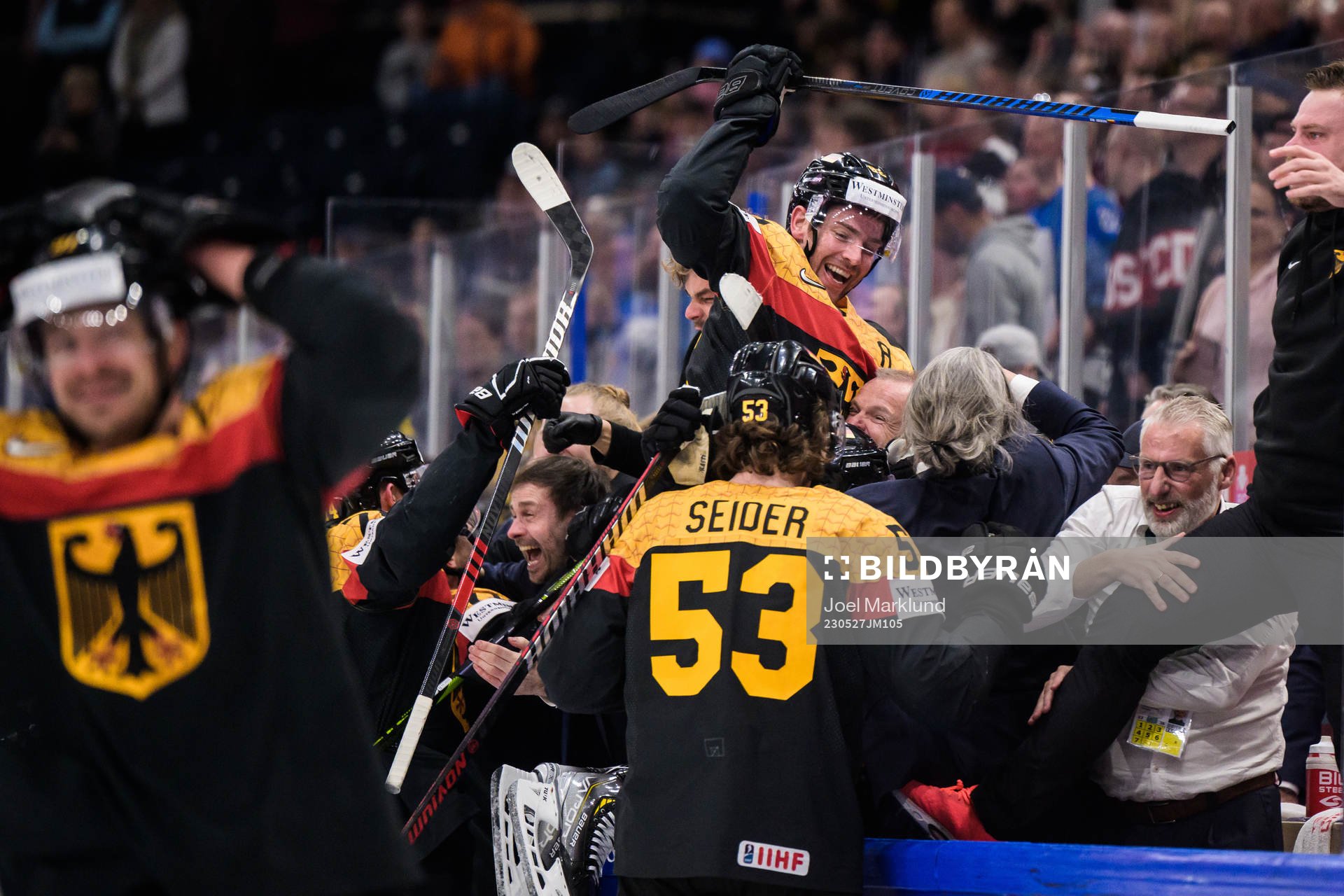 Moritz Seider and Marcel Noebels of Germany celebrate with