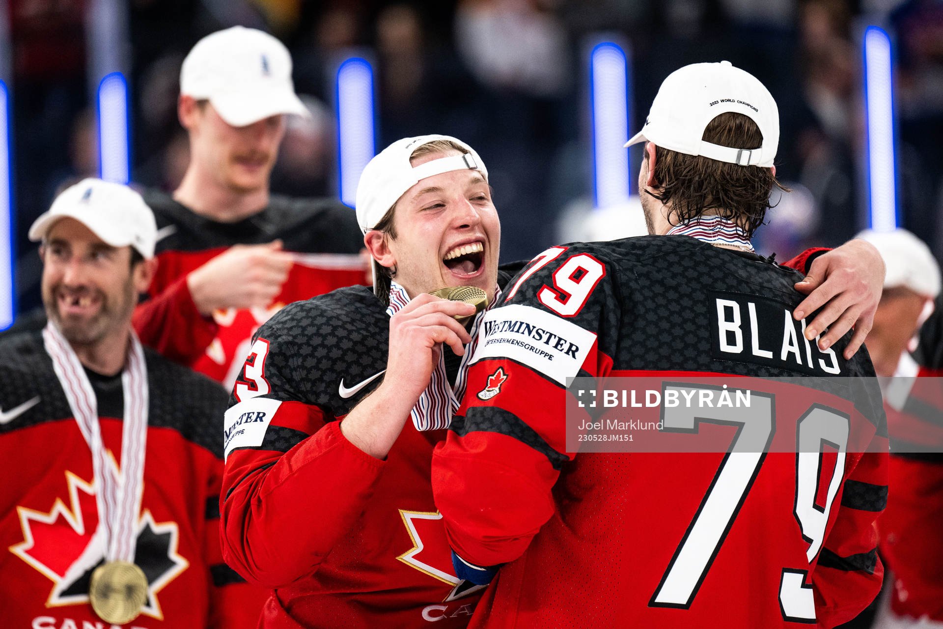 Jake Neighbours and Samuel Blais of Canada celebrate