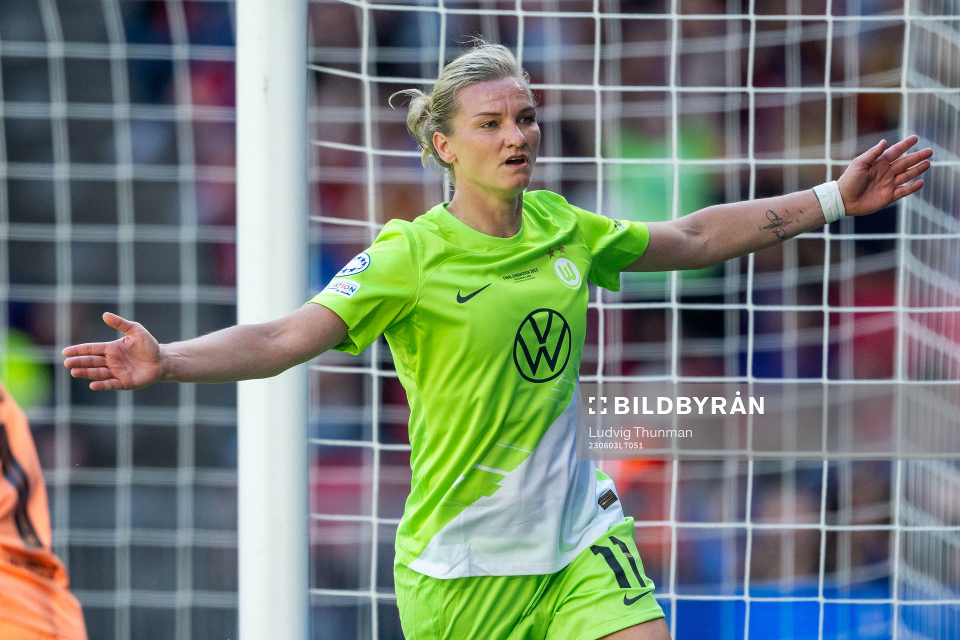 Alexandra Popp of Wolfsburg celebrates scoring 0-2