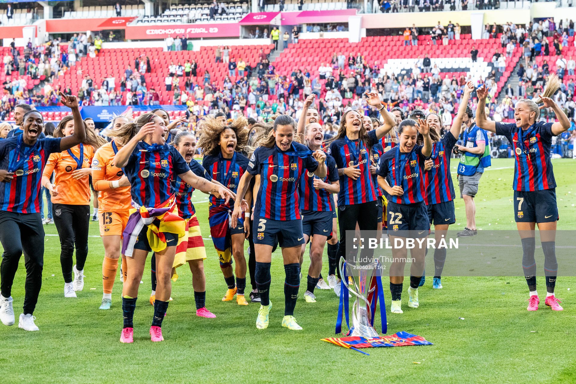 Playersof Barcelona celebrate with the trophy