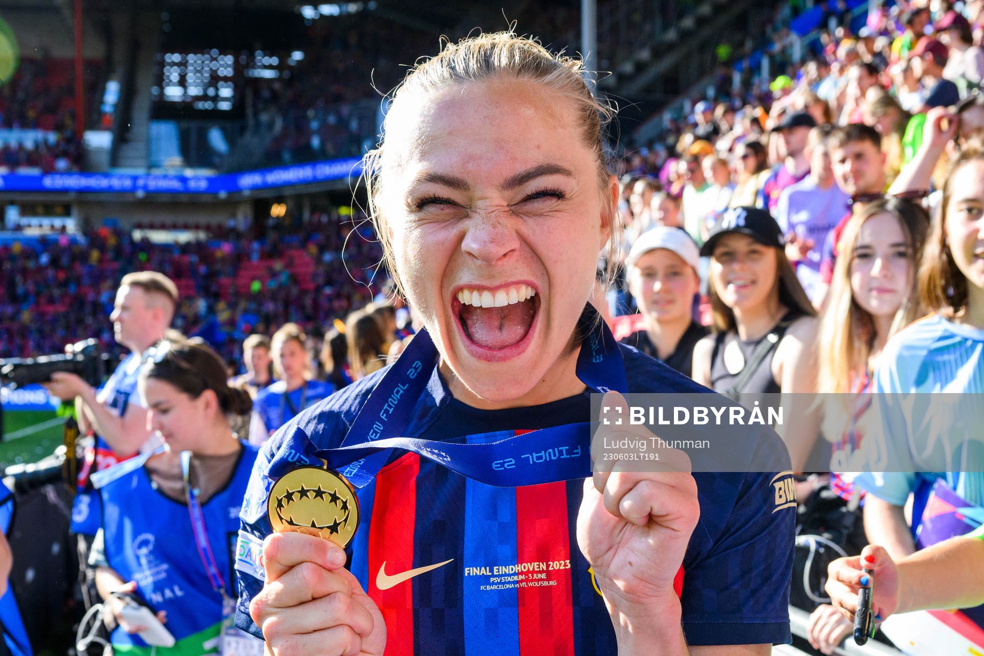Fridolina Rolfö of Barcelona celebrates with her gold medal