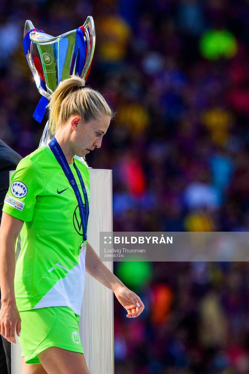 Rebecka Blomqvist of Wolfsburg looks dejected as she passes