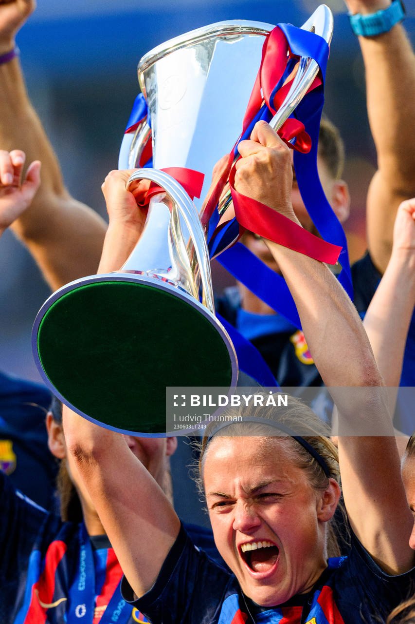 Irene Paredes of Barcelona lifts the trophy