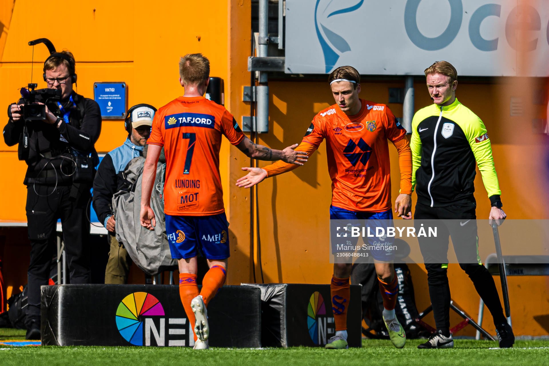 Kasper Lunding of Aalesund leaves the pitch with an injury