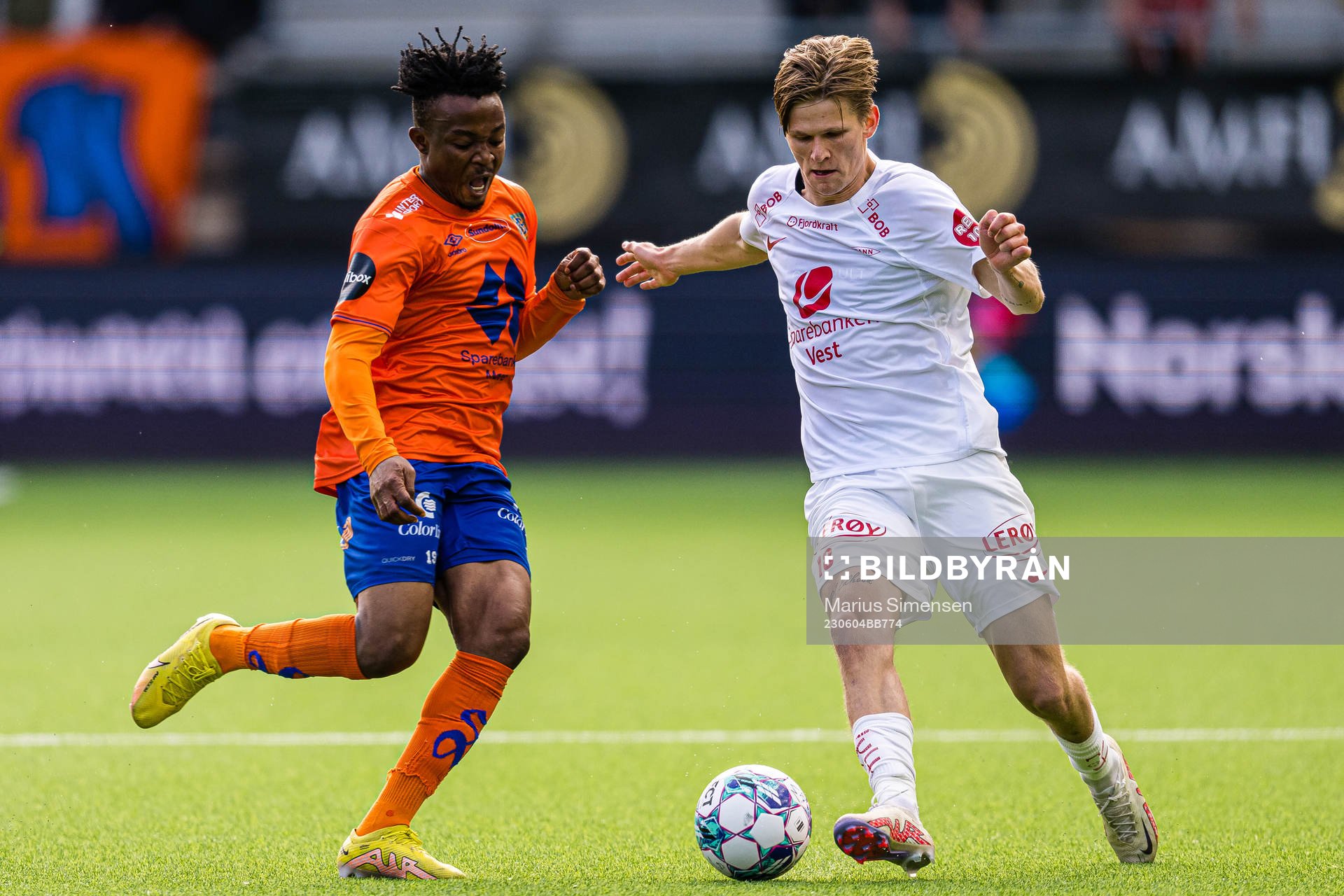 Isaac Atanga of Aalesund and David Møller Wolfe of Brann