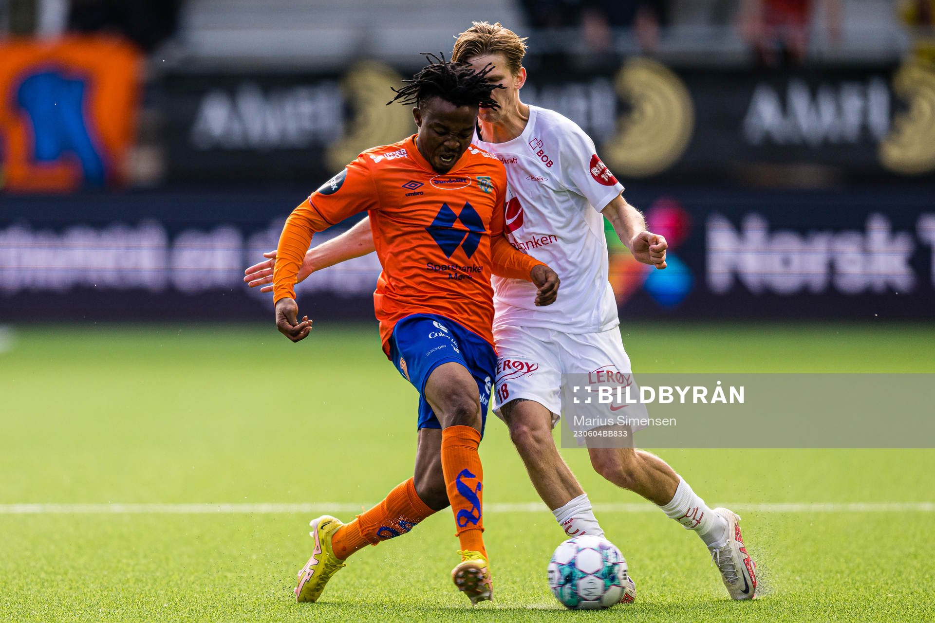 Isaac Atanga of Aalesund and David Møller Wolfe of Brann