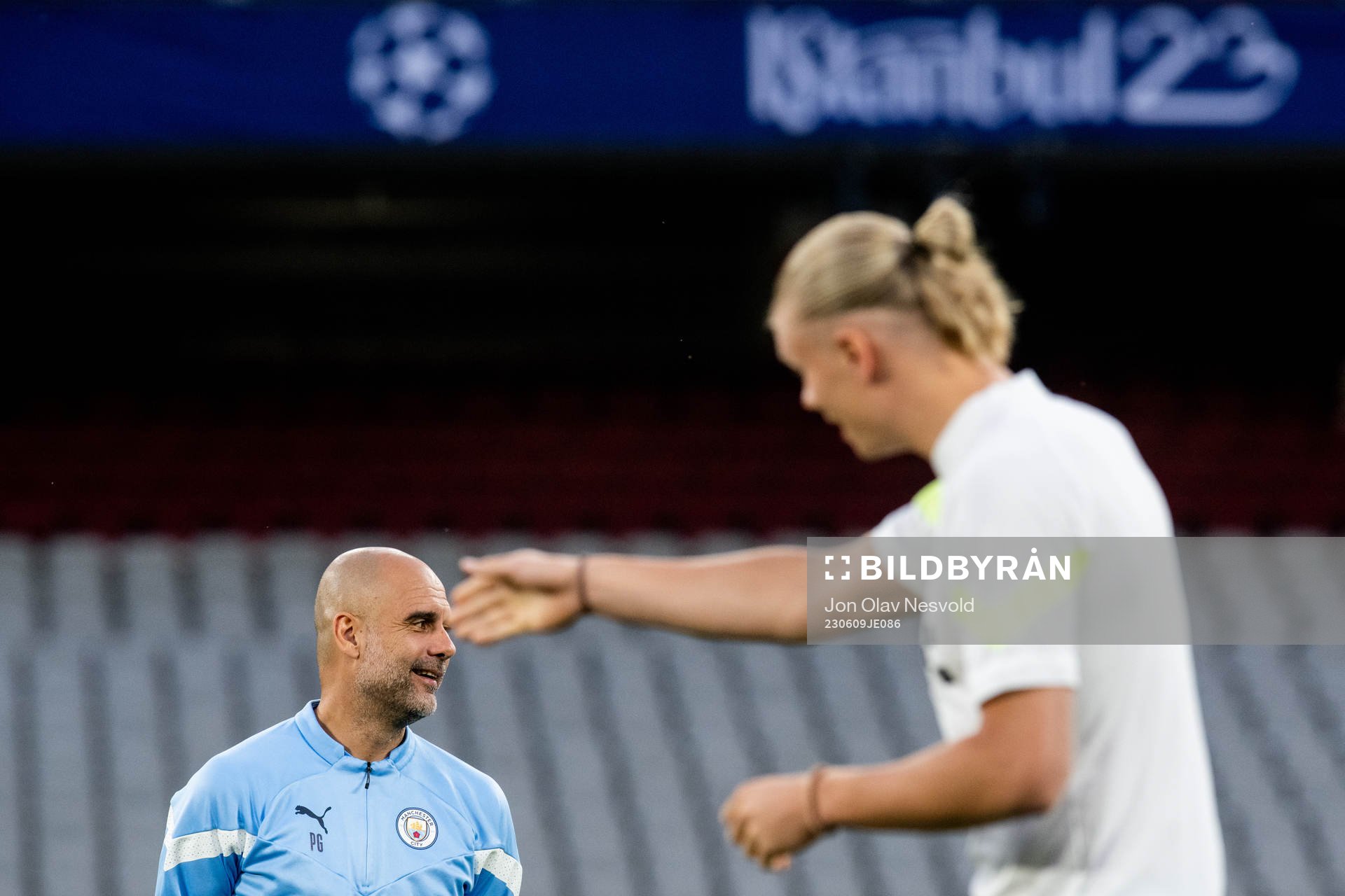 Pep Guardiola, head coach, and Erling Braut Haaland of