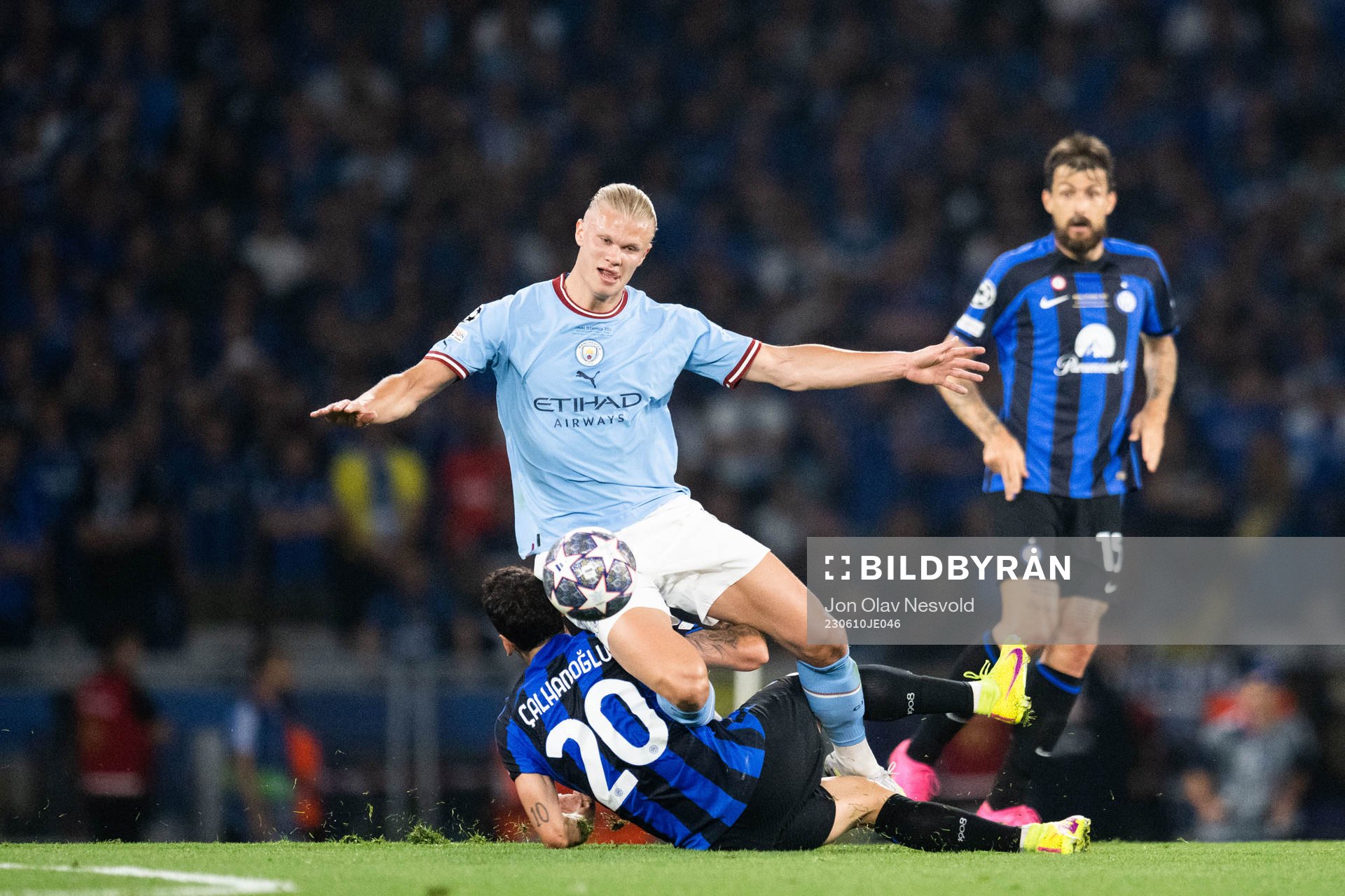 Erling Braut Haaland of Manchester City and Hakan Calhanoglu of Inter during the UEFA Champions League football match between Manchester City and Inter on June 10, 2023 in Istanbul.