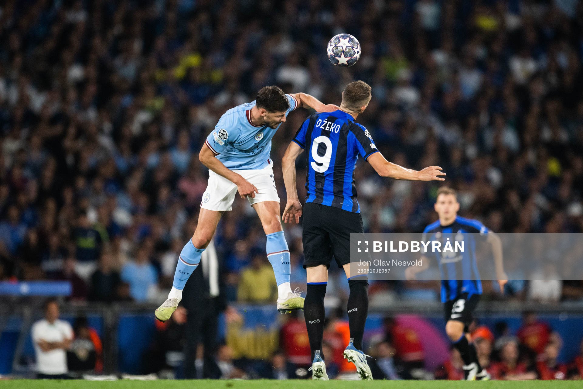 Ruben Dias of Manchester City and Edin Dzeko of Inter