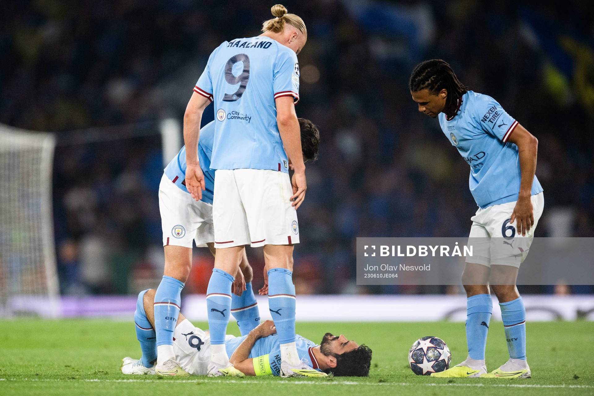 Ilkay Gundogan, Erling Braut Haaland and Nathan Ake of