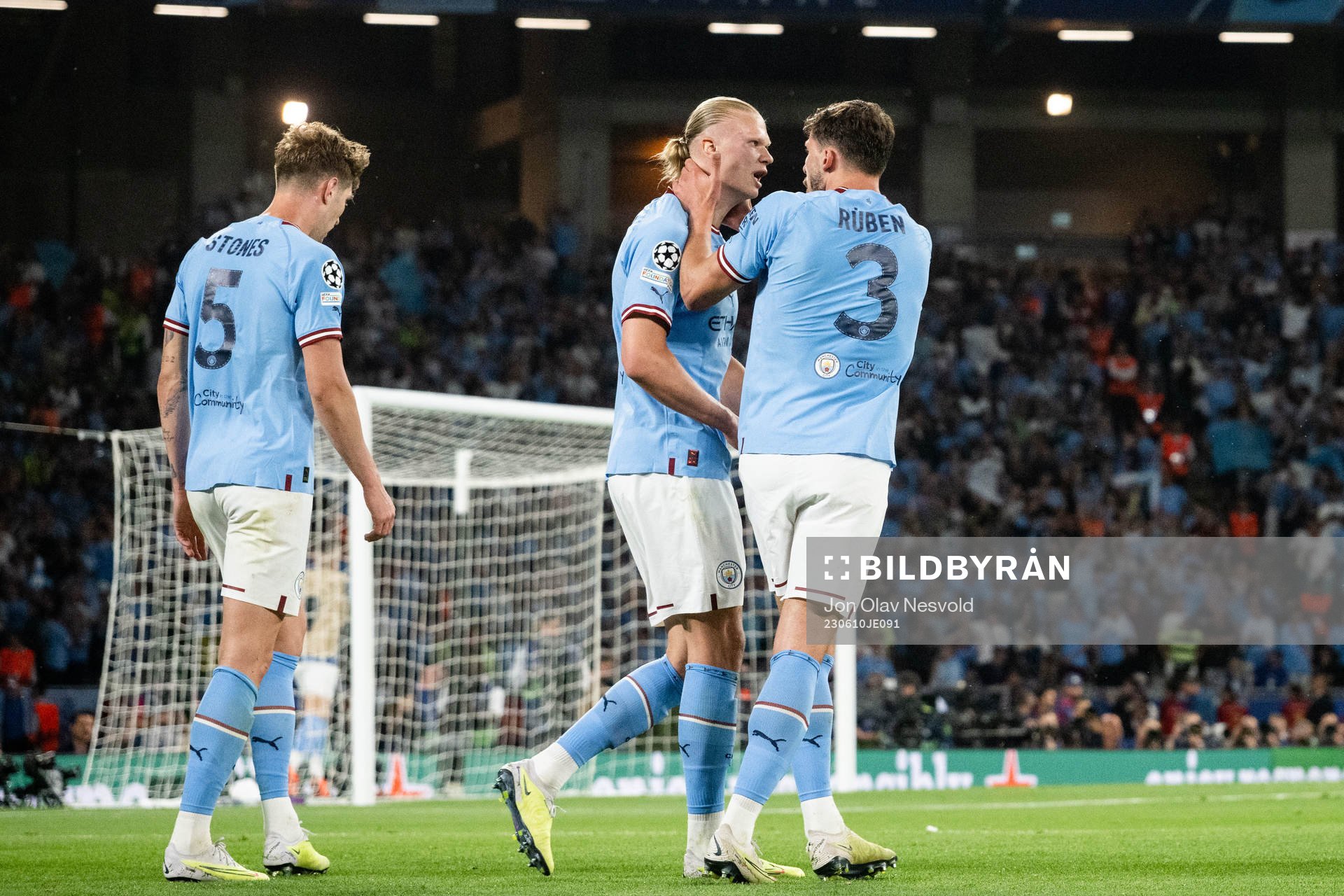 John Stones, Erling Braut Haaland and Ruben Dias of