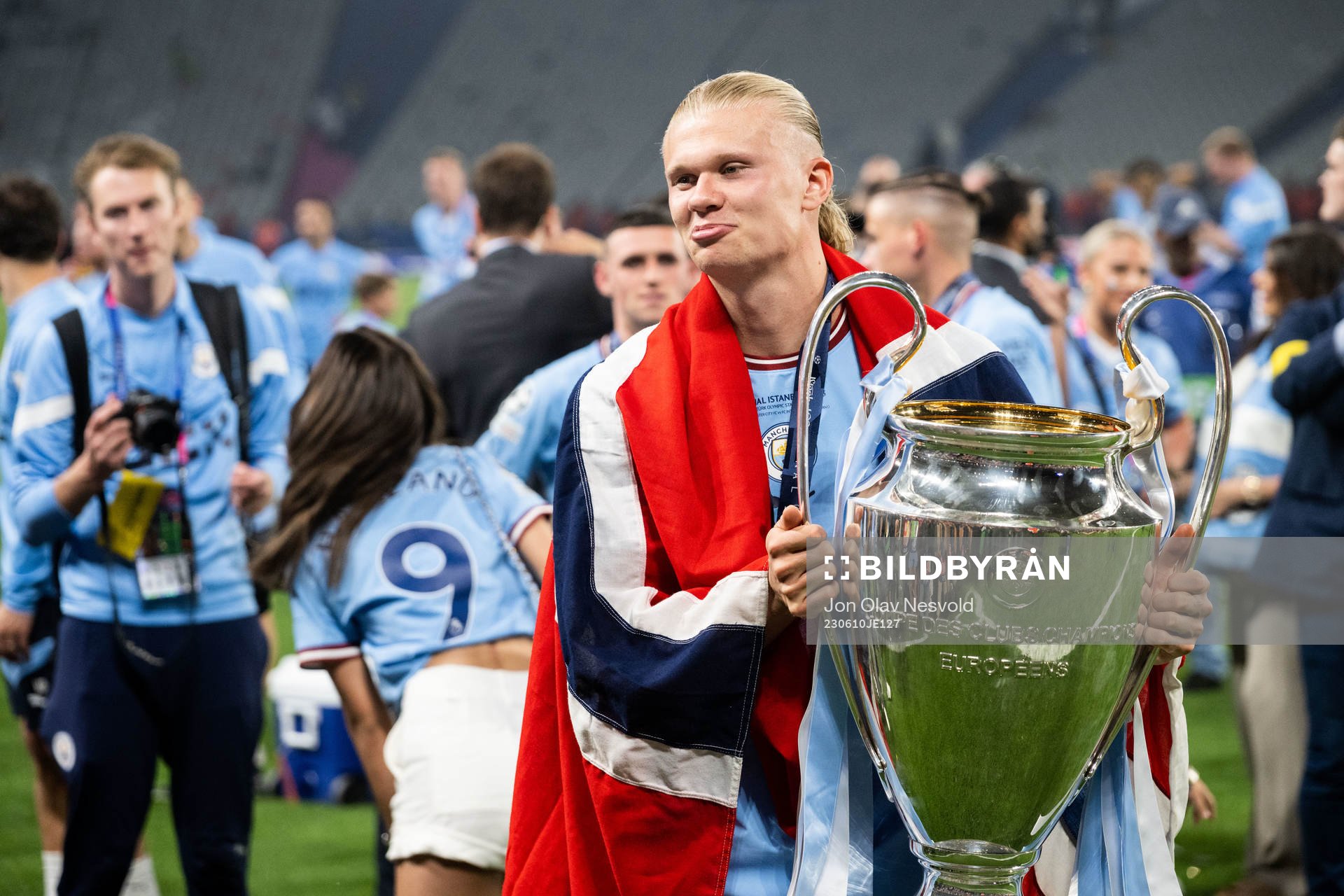Erling Braut Haaland of Manchester City and the trophy