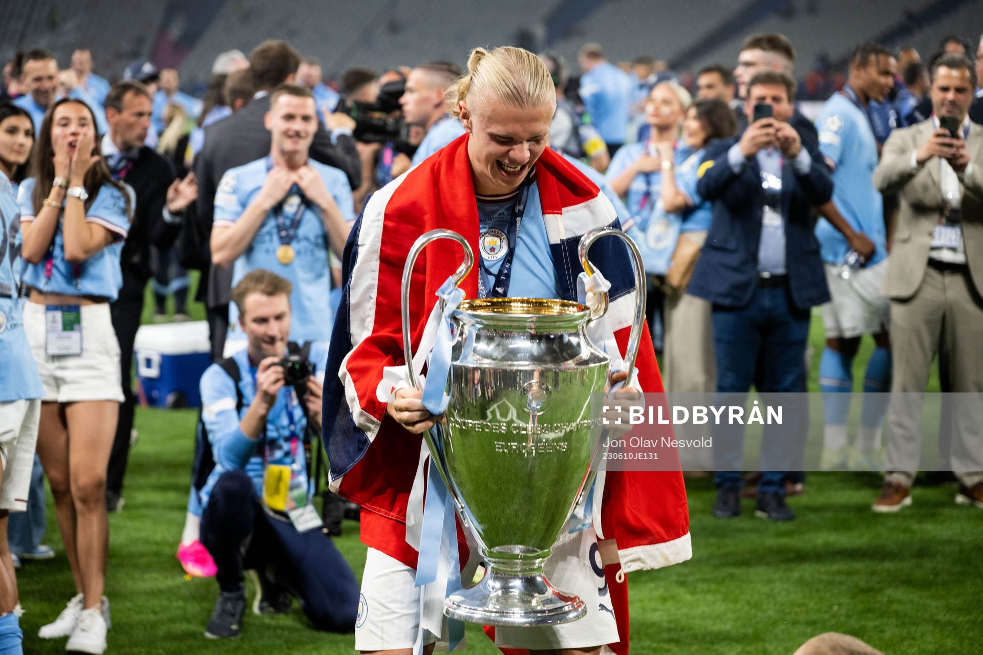 Erling Braut Haaland of Manchester City and the trophy