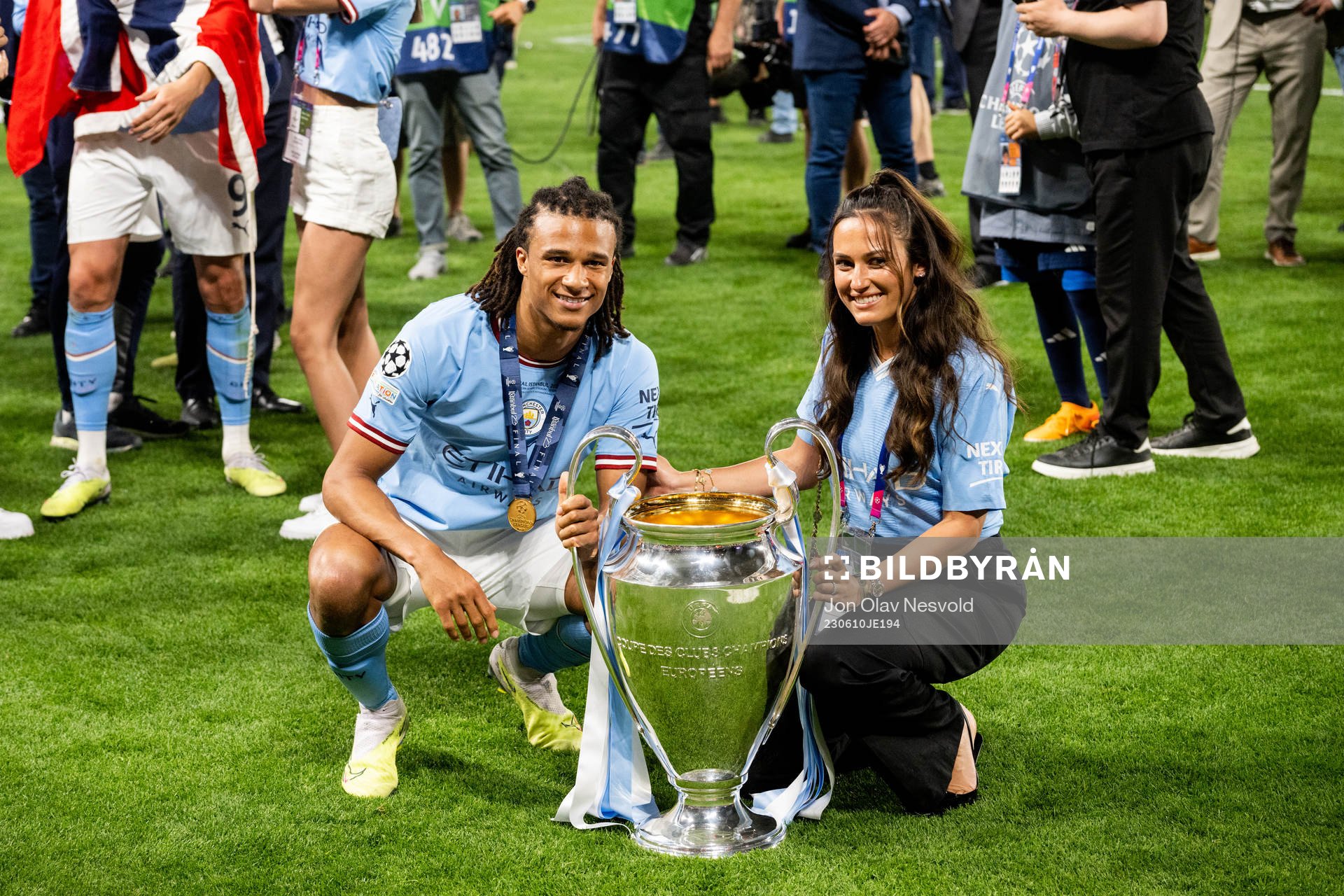 Nathan Ake of Manchester City celebrates with the trophy