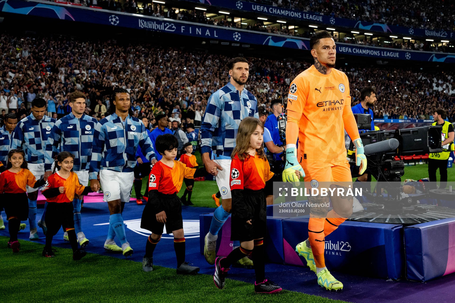 Goalkeeper Ederson of Manchester City enters the pitch