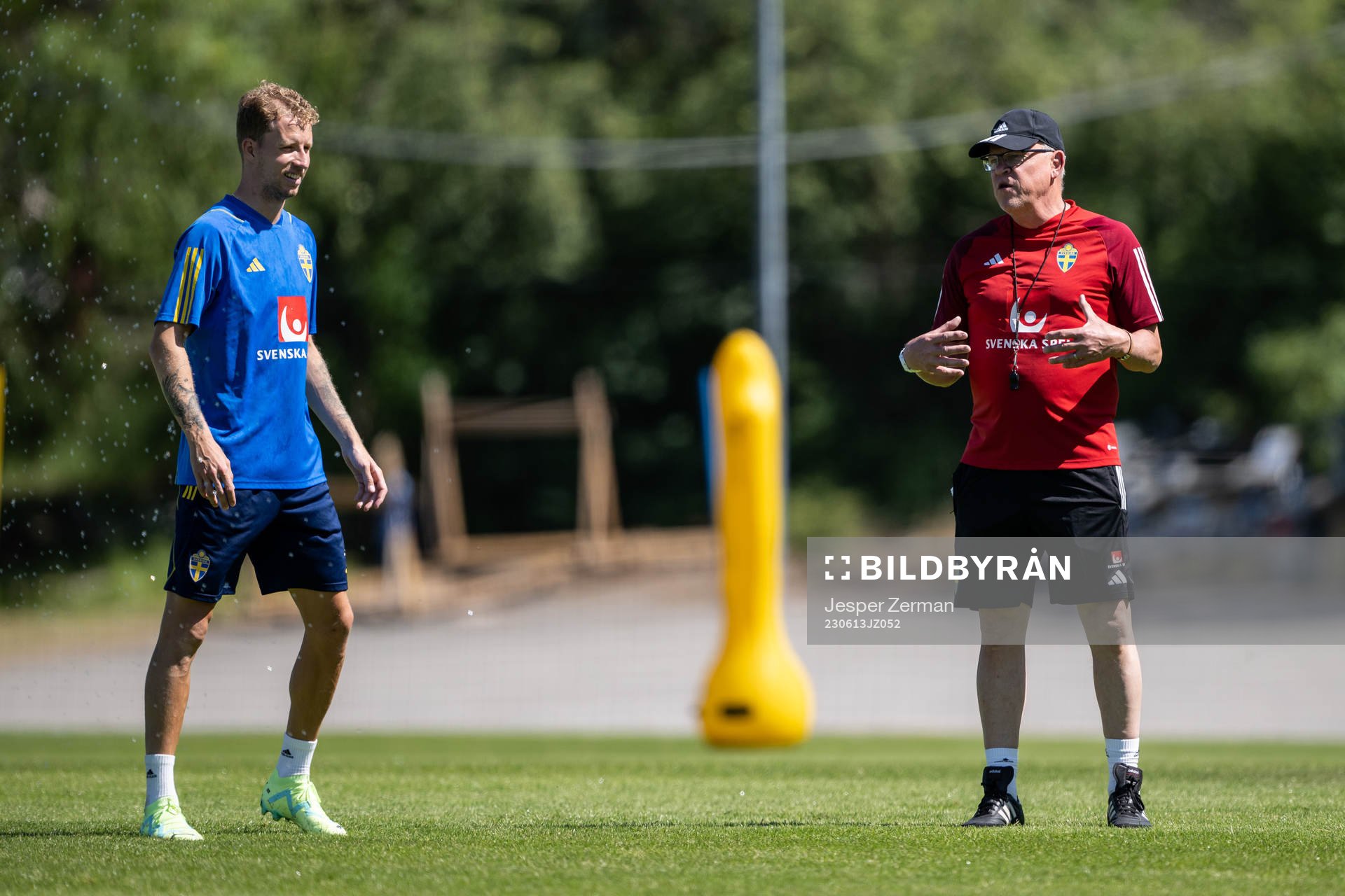 Samuel Gustafson and head coach Janne Andersson of the