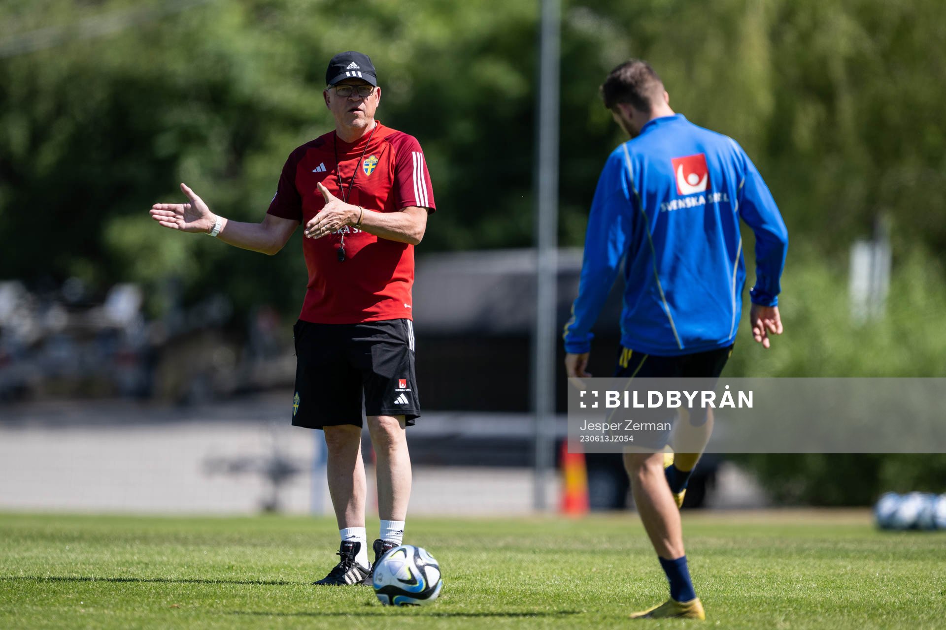 head coach Janne Andersson and Marcus Rohdén of the