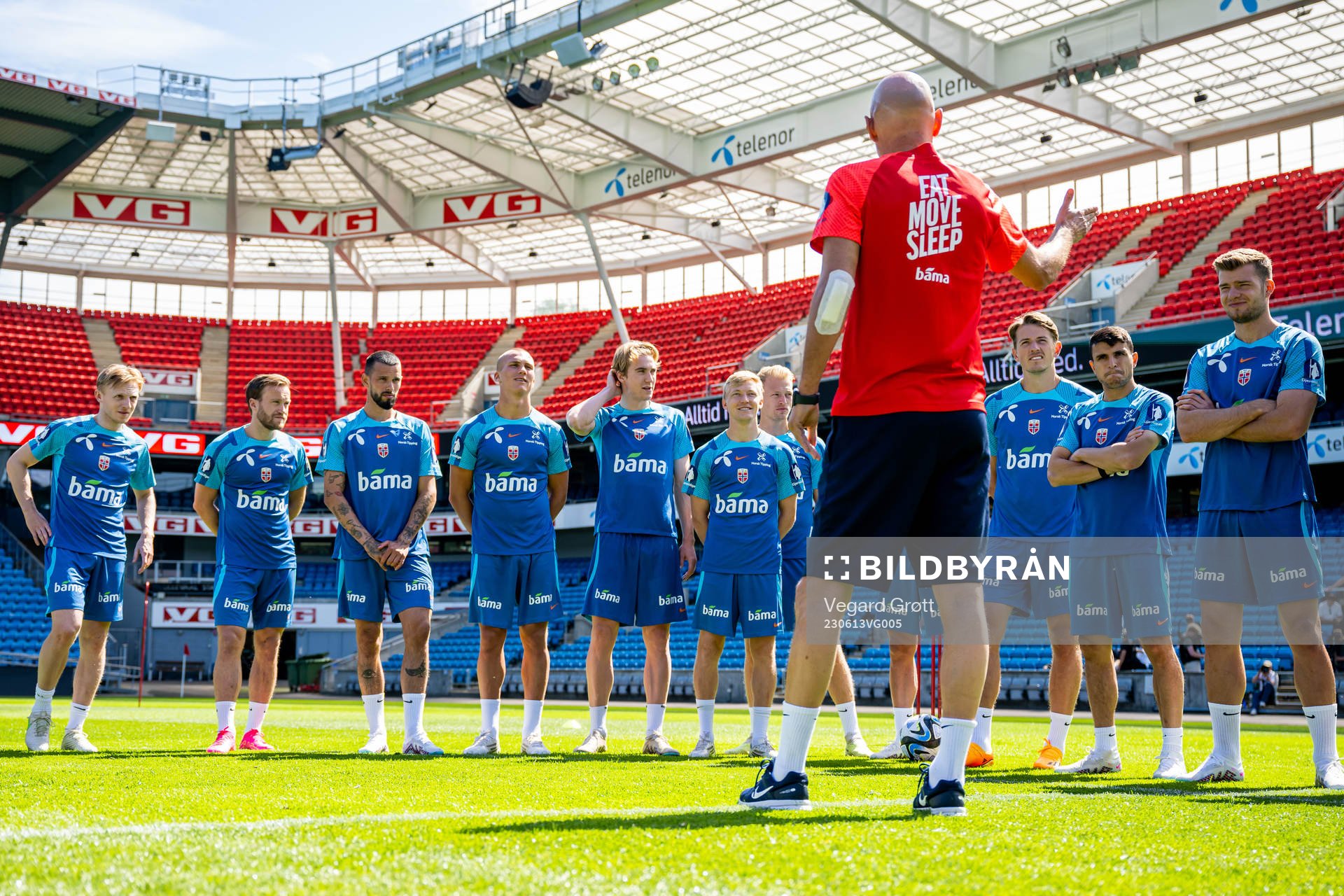 Players of the Norwegian national football team listen to head coach Ståle Solbakken during a training session on June 13, 2023 in Oslo. From left: Mats Møller Dæhli, Bård Finne, Kristoffer Velde, Leo Skiri Østigård, Kristian Thorstvedt, Birger Meling, Andreas Hanche-Olsen, Sander Berge, Mohamed Elyounoussi and Alexander Sørloth.