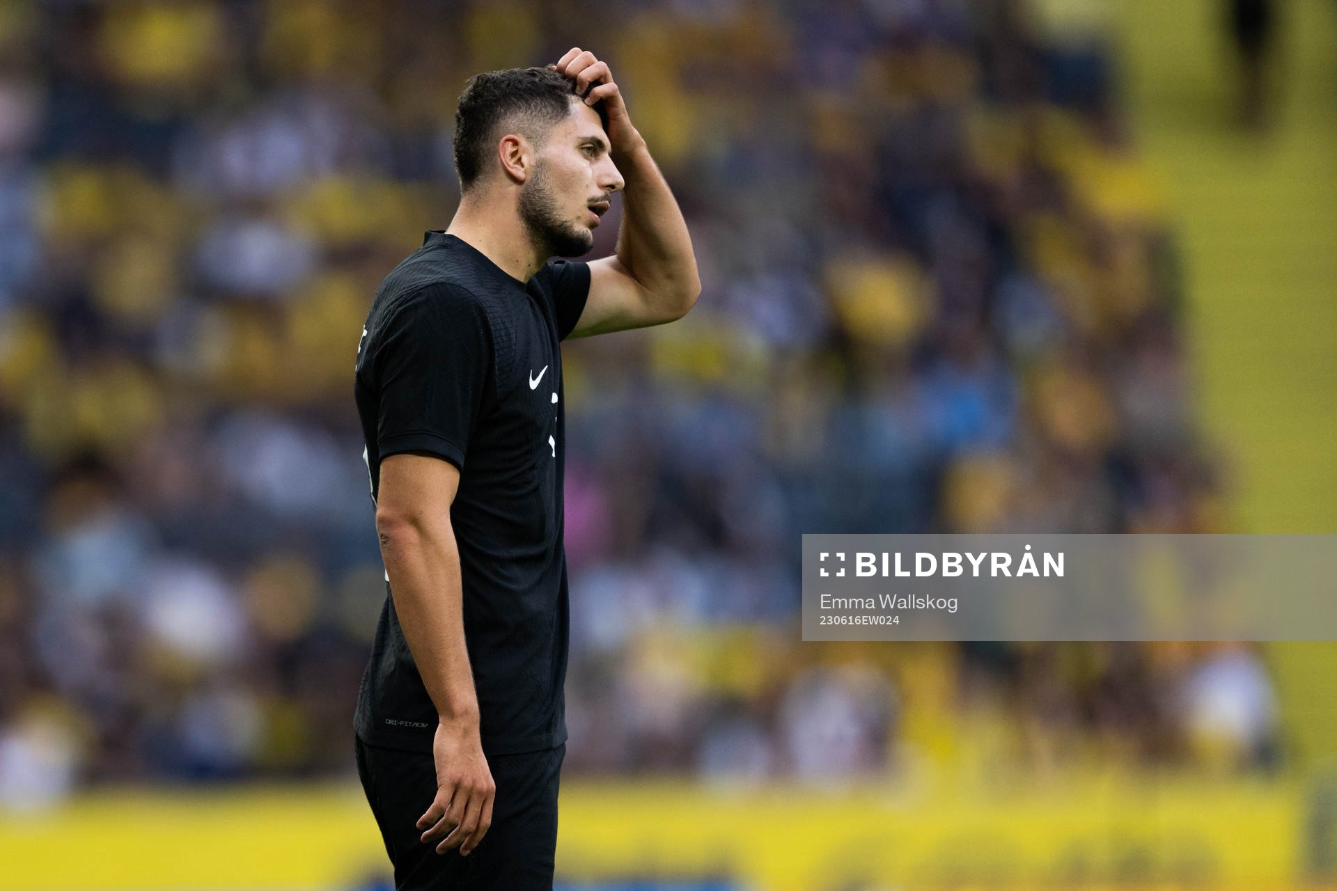 Liberato Cacace of New Zealand looks dejected