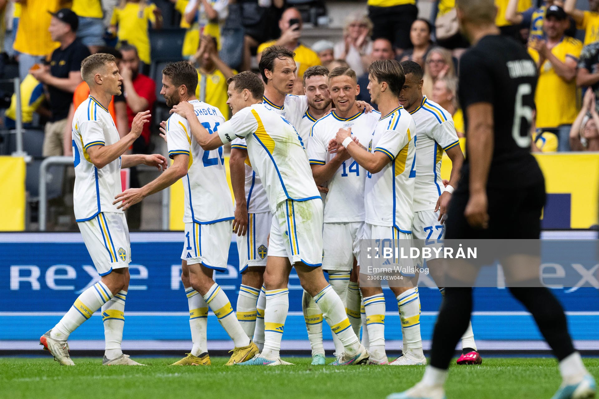 Jesper Karlsson of Sweden celebrates with his team mates
