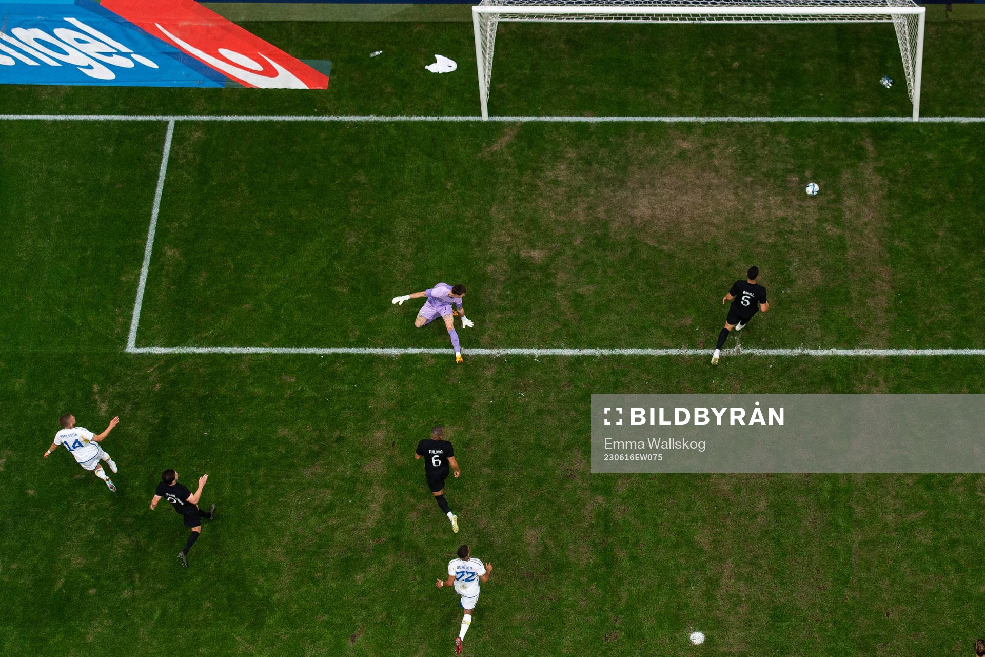 Jesper Karlsson of Sweden scores 3-1 behind goalkeeper Oli