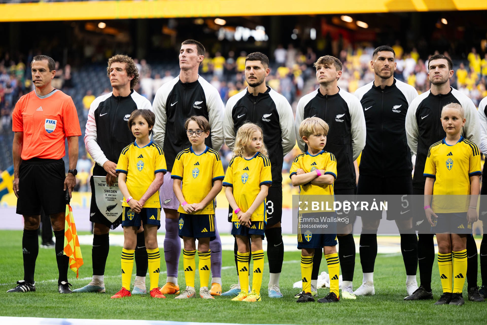 Mascots infront of players of New Zealand