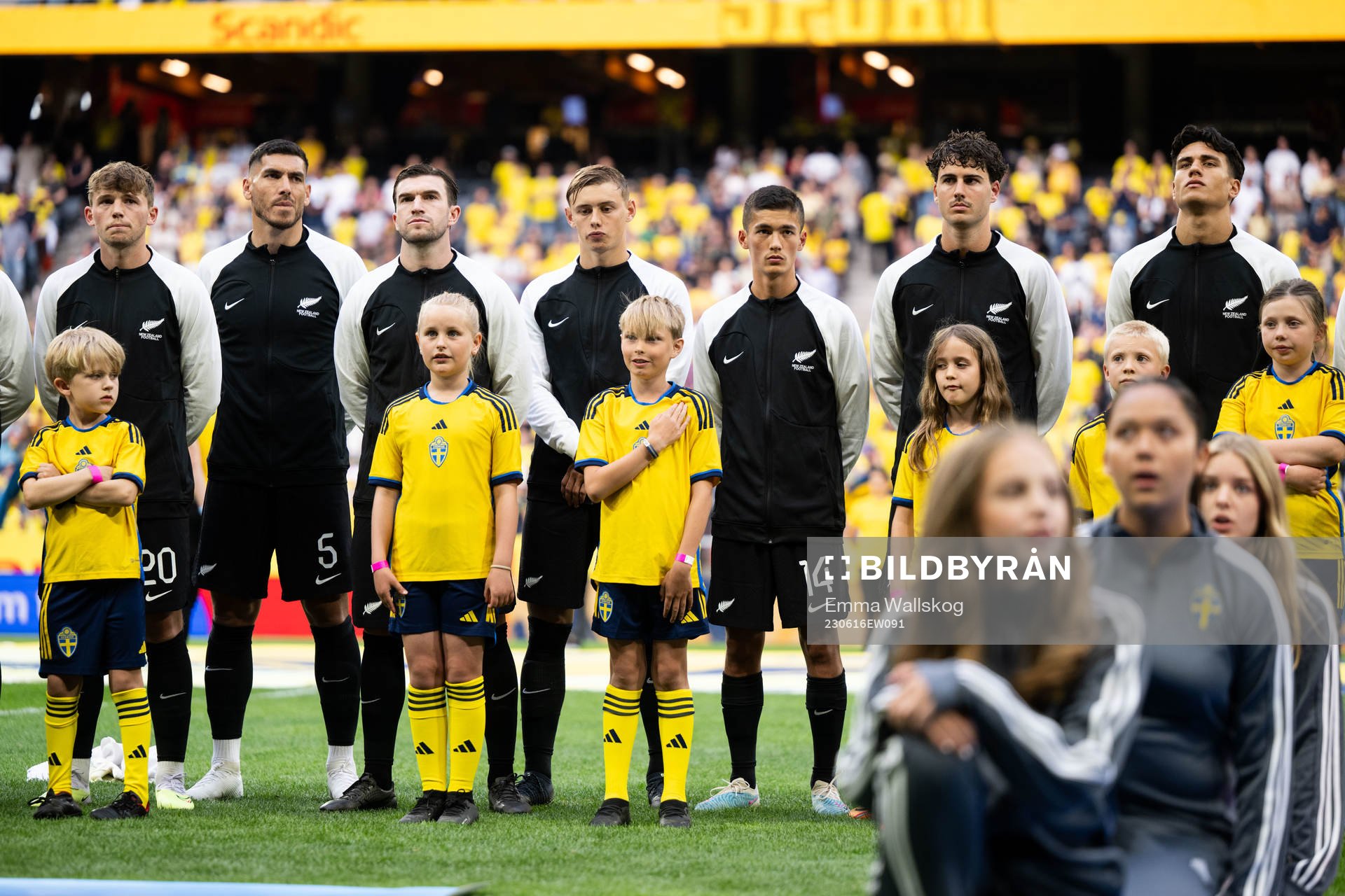 Mascots infront of players of New Zealand