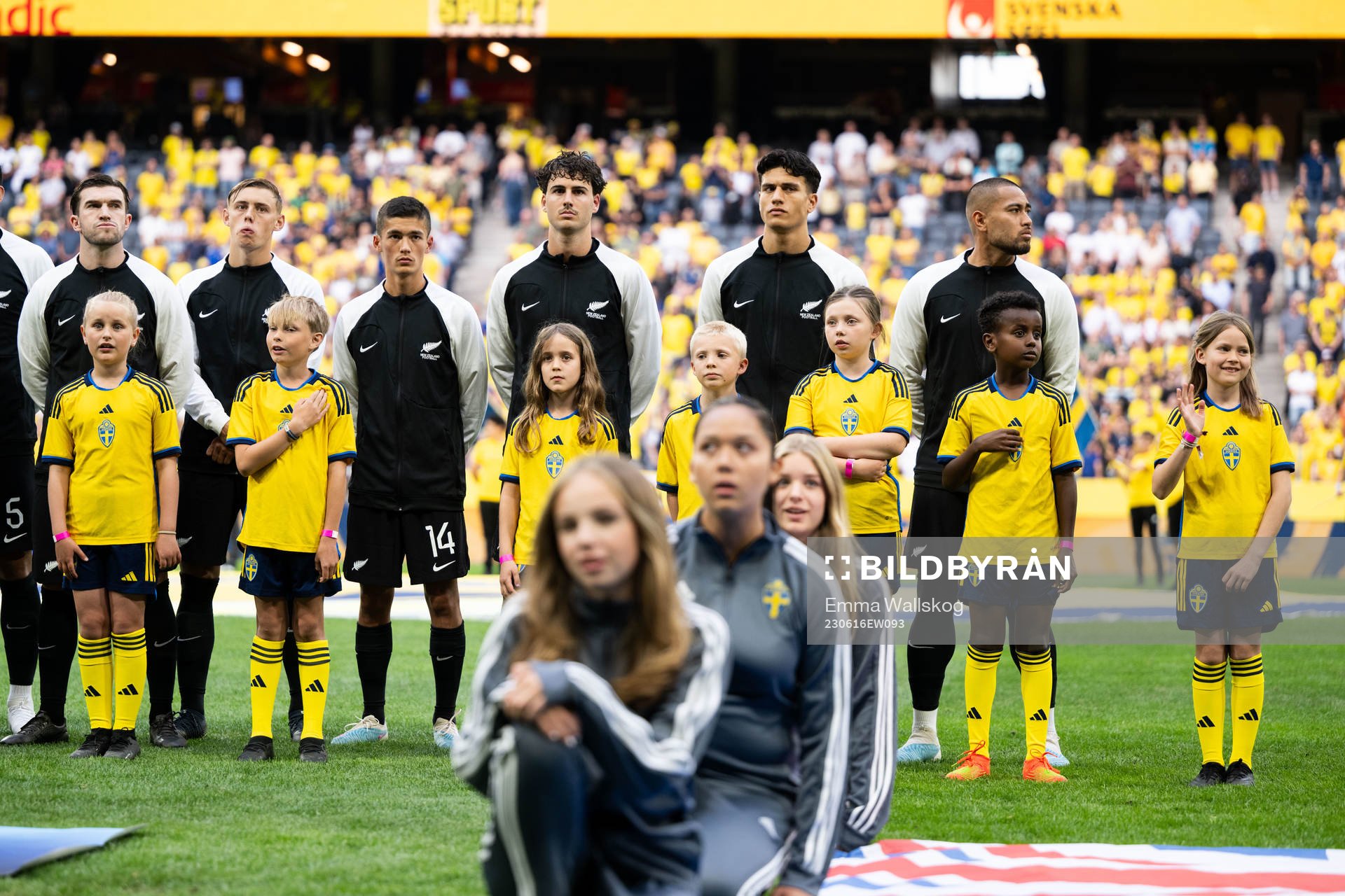 Mascots infront of players of New Zealand
