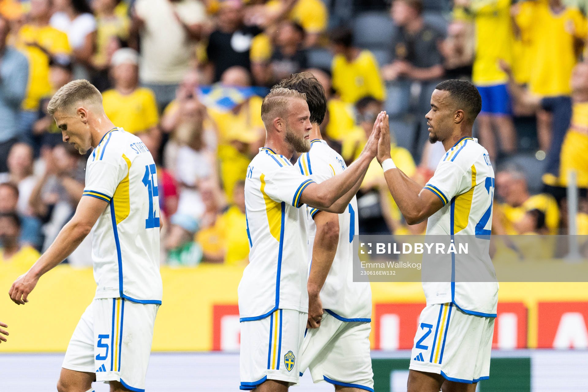 Robin Quaison of Sweden celebrates with Daniel Sundgren