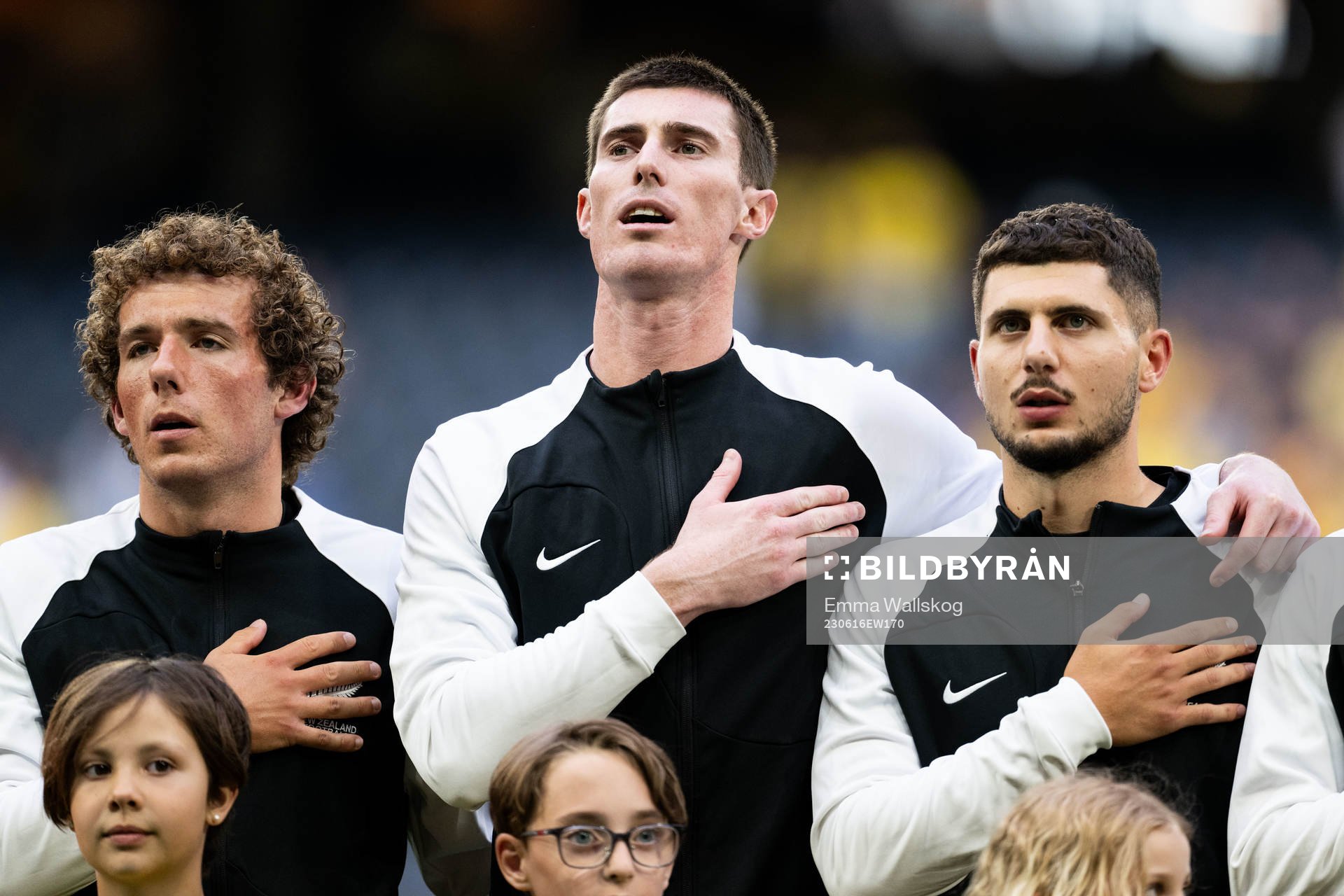 Joe Bell, goalkeeper Oli Sail and Liberato Cacace  of New