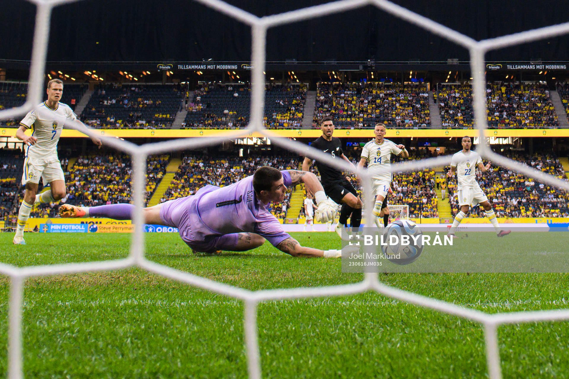 Goalkeeper Oli Sail of New Zealand lets in the 1-1 goal by