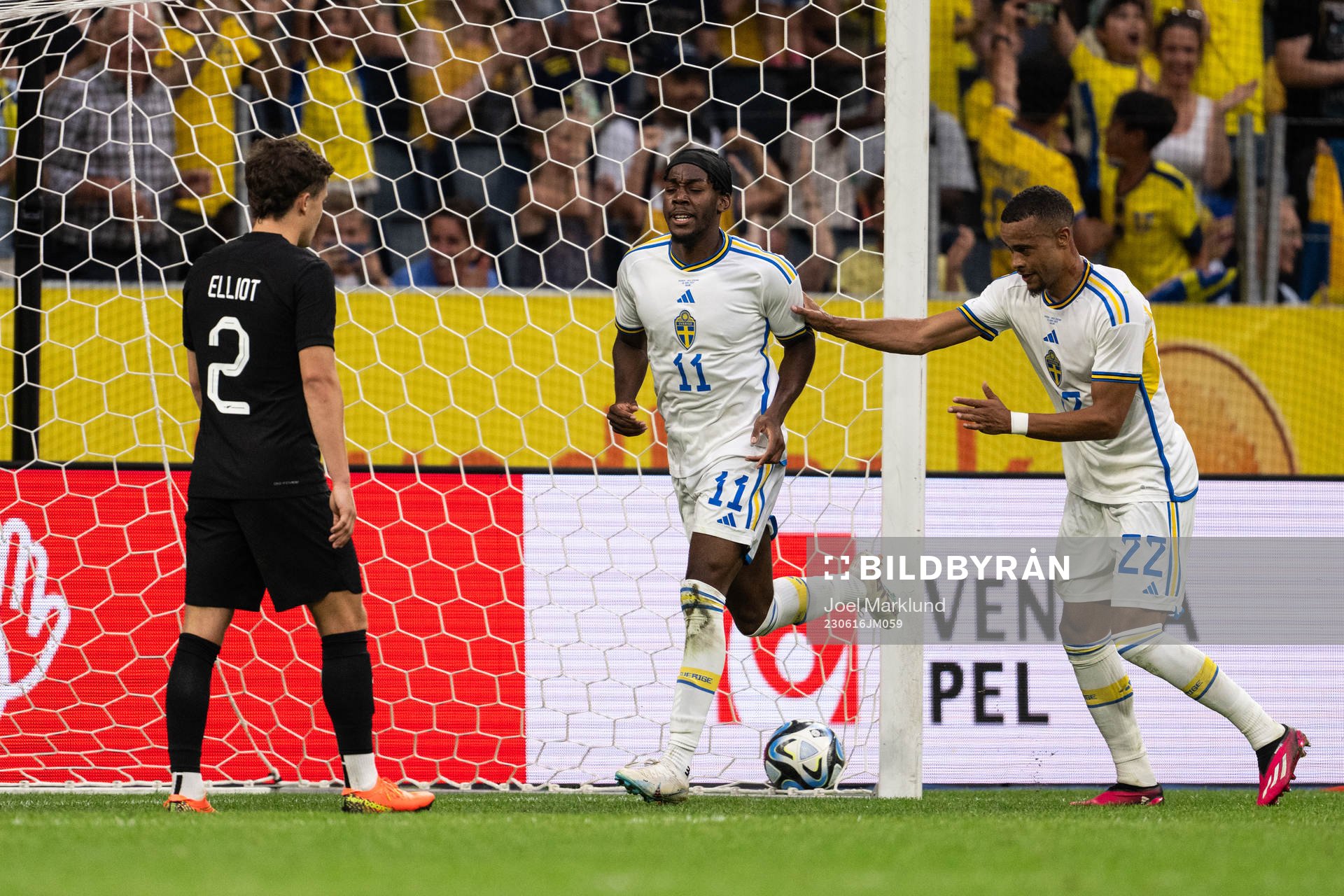 Anthony Elanga and Robin Quaison of Sweden celebrate