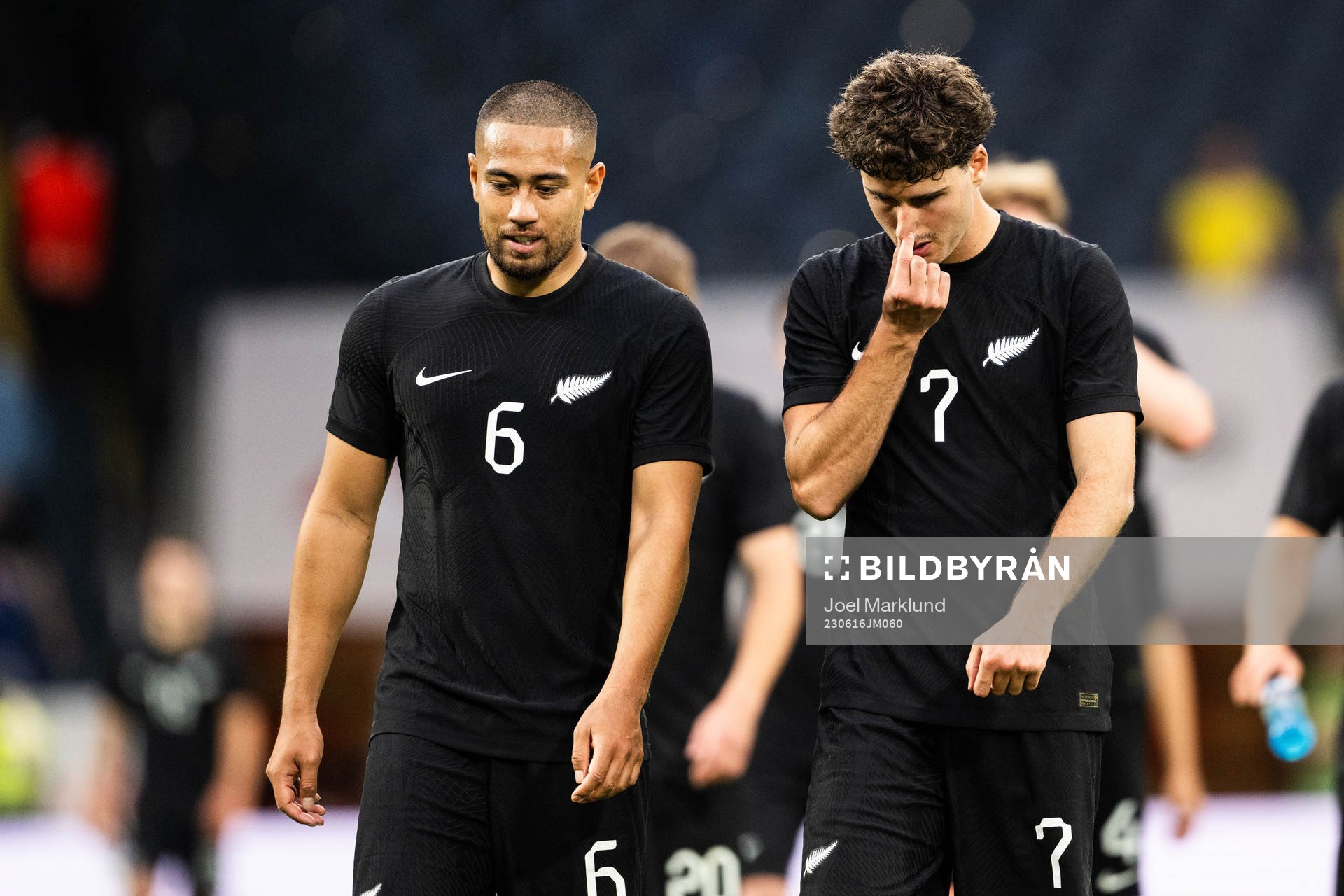 Bill Tuiloma and Matt Garbett of New Zealand looks dejected
