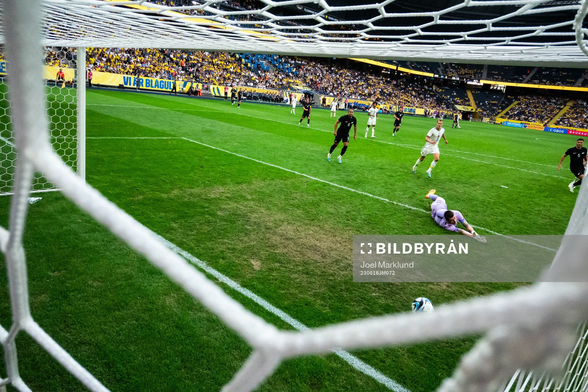 Goalkeeper Oli Sail of New Zealand lets in the 1-1 goal by