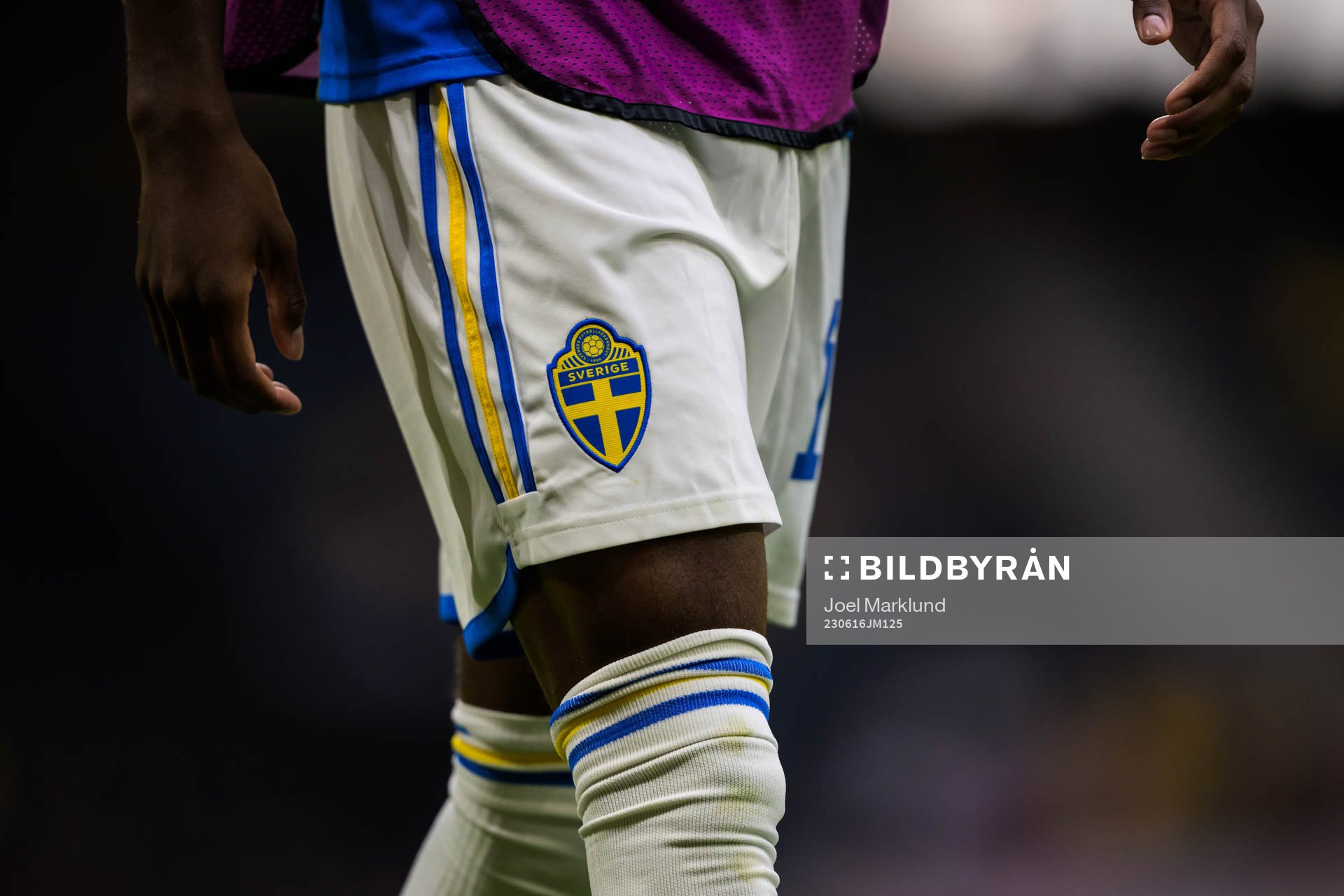 Detail of the Swedish emblem on shorts of Anthony Elanga of Sweden during the international friendly football match between Sweden and New Zealand on June 16, 2023 in Stockholm.