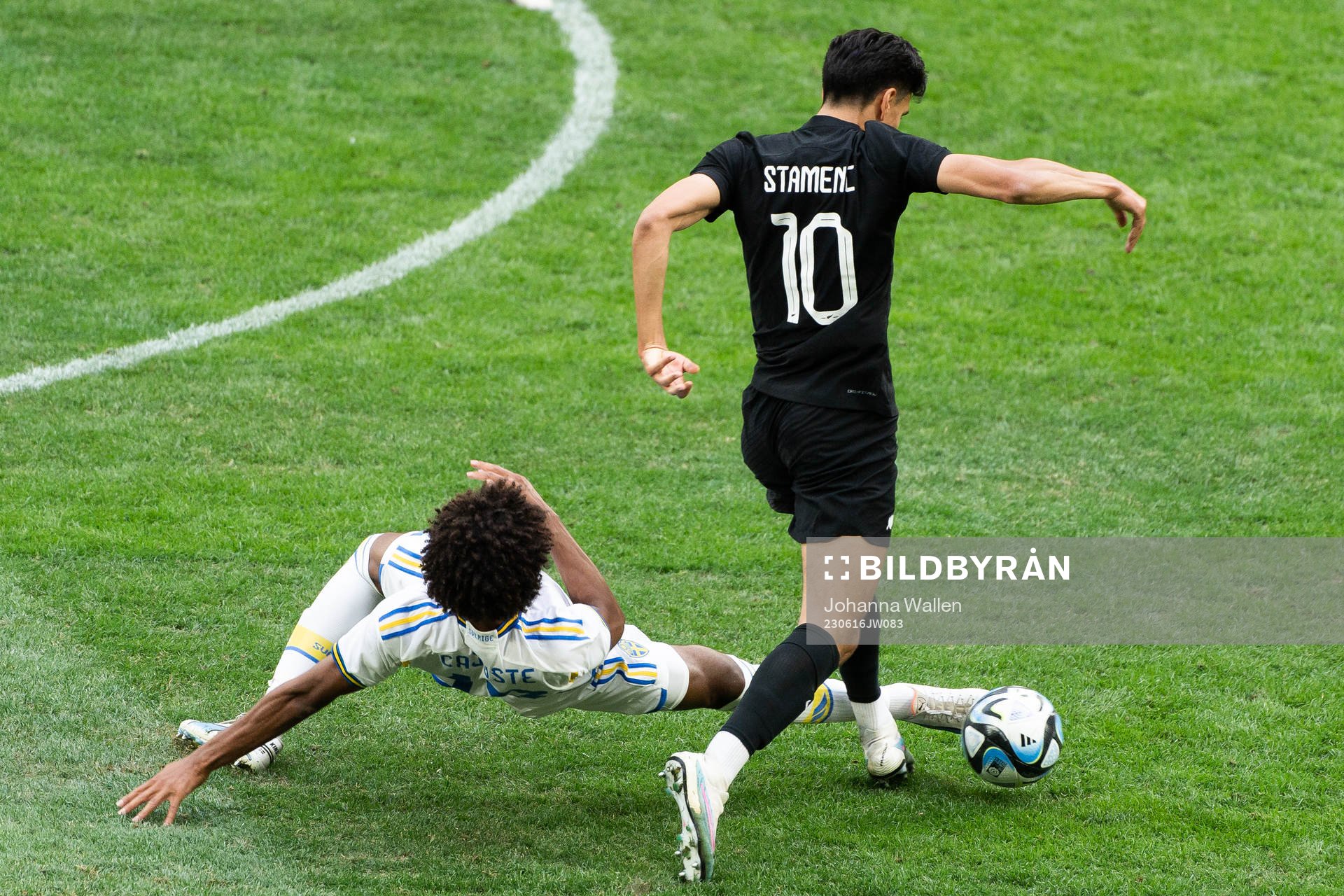 Jens Cajuste of Sweden and Marko Stamenic of New Zealand