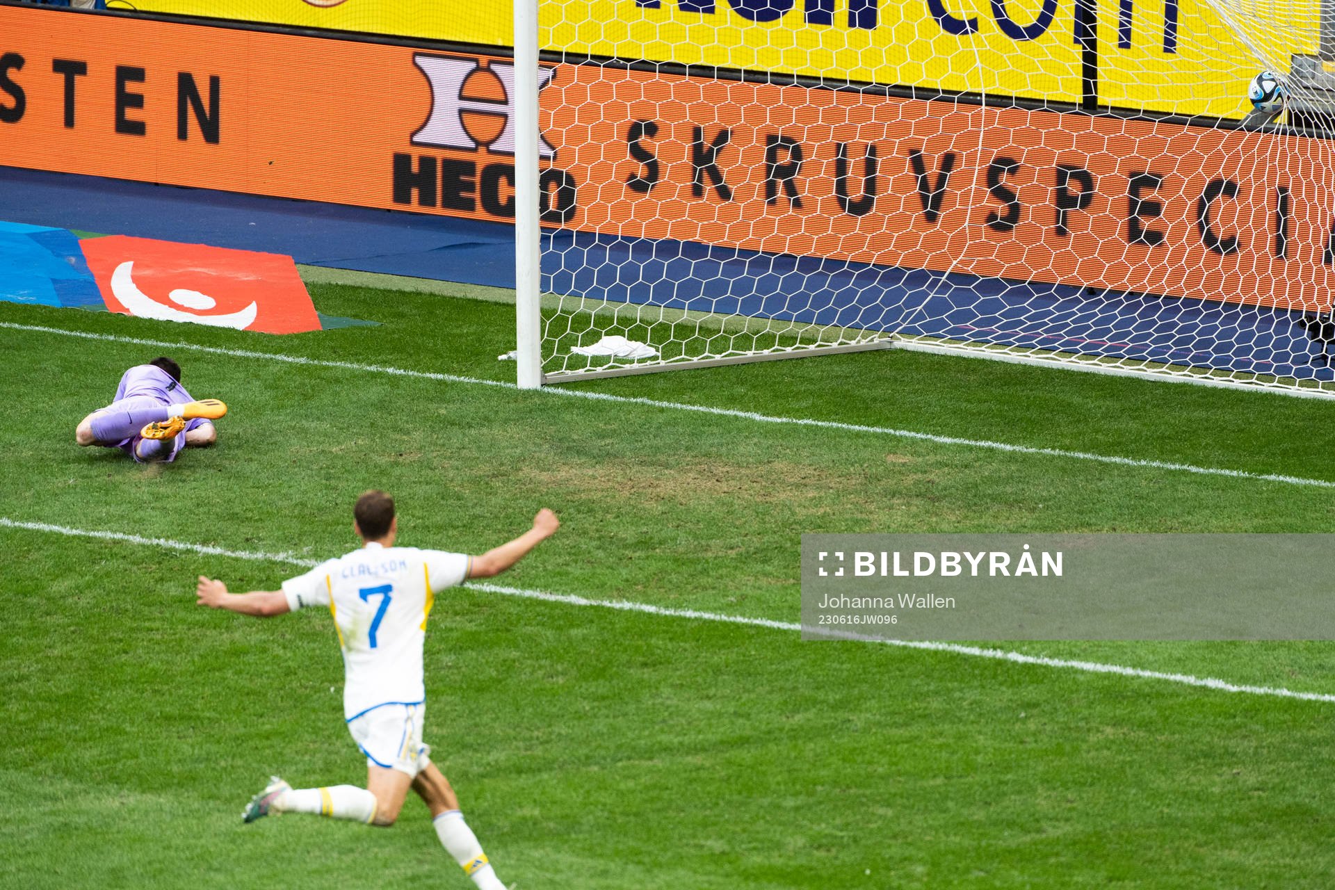 Goalkeeper Oli Sail looks dejected and Viktor Claesson of