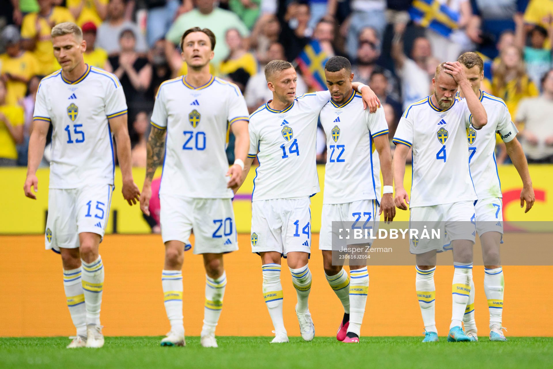 Jesper Karlsson and Robin Quaison of Sweden celebrate
